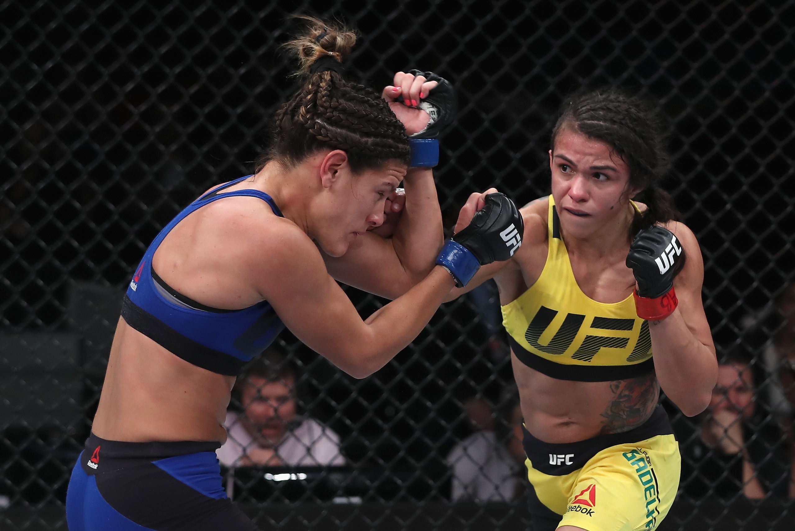 SAO PAULO, BRAZIL - NOVEMBER 19:  Claudia Gadelha of Brazil punches Cortney Casey of the United States during their women's strawweight bout at the UFC Fight Night Bader v Minotouro at Ibirapuera Gymnasium on November 19, 2016 in Sao Paulo, Brazil.  (Phot