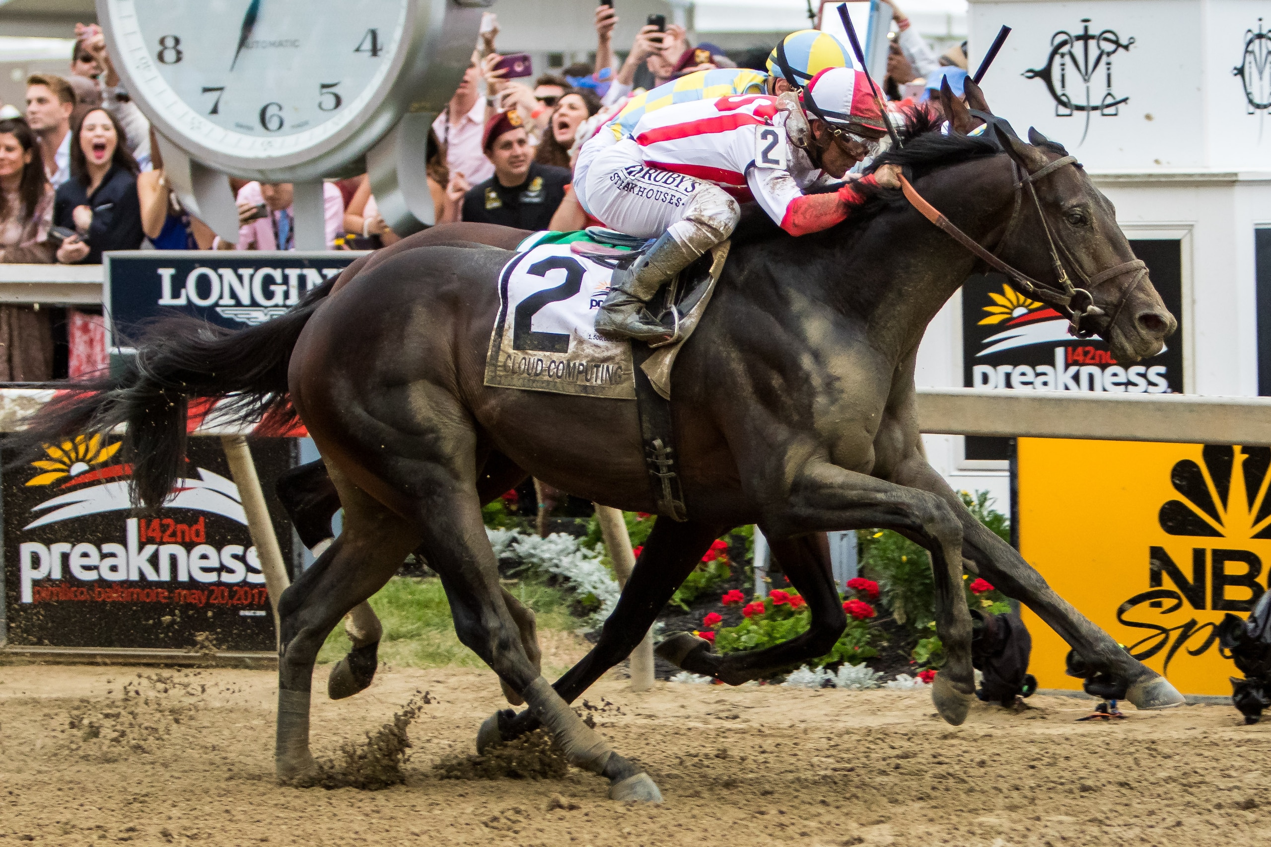 BALTIMORE, MD - MAY 20: Cloud Computing  #2, ridden by Javier Castellano, the 142nd Preakness Stakes ahead of Classic Empire  #5, ridden by Julien Leparoux, on Preakness Stakes Day at Pimlico Race Course on May 20, 2017 in Baltimore, Maryland. (Photo by S