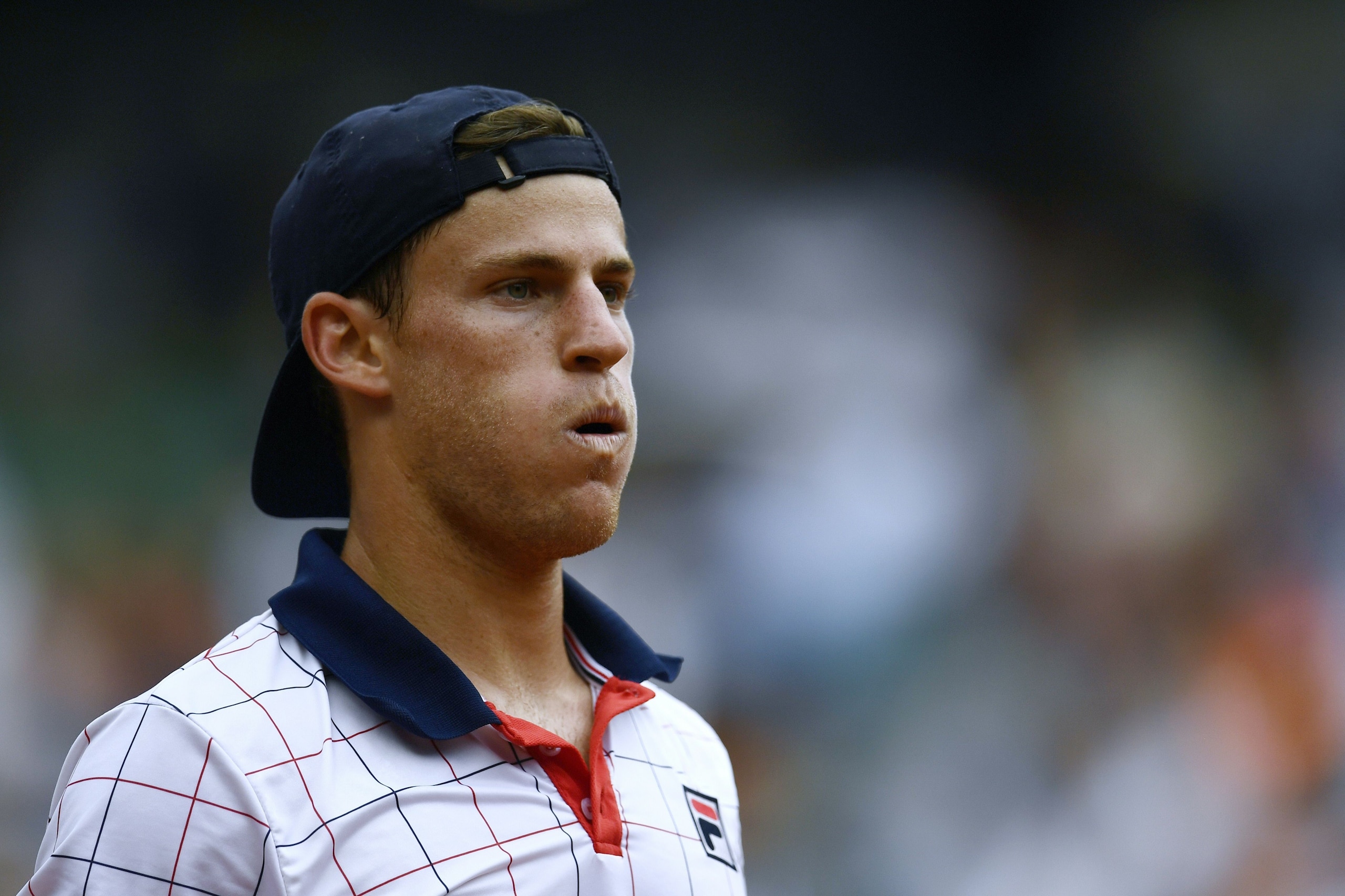 Argentina's Diego Schwartzman looks on as he plays against Serbia's Novak Djokovic during their tennis match at the Roland Garros 2017 French Open on June 2, 2017 in Paris. / AFP PHOTO / CHRISTOPHE SIMON (Photo credit should read CHRISTOPHE SIMON/ Argentina's Diego Schwartzman looks on as he plays against Serbia's Novak Djokovic during their tennis match at the Roland Garros 2017 French Open on June 2, 2017 in Paris. / AFP PHOTO / CHRISTOPHE SIMON (Photo credit should read CHRISTOPHE SIMON/