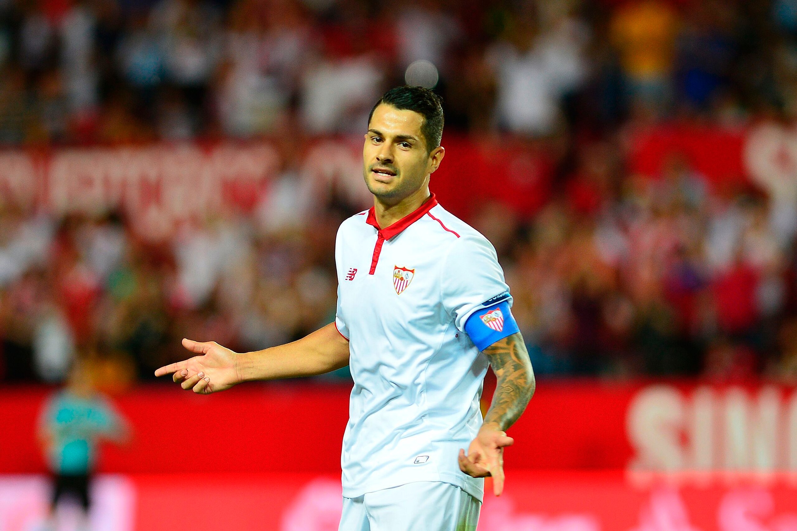Sevilla's midfielder Vitolo celebrates after scoring a goal during the Spanish league football match Sevilla FC vs CA Osasuna at the Ramon Sanchez Pizjuan stadium in Sevilla on May 20, 2017. / AFP PHOTO / CRISTINA QUICLER        (Photo credit should read 