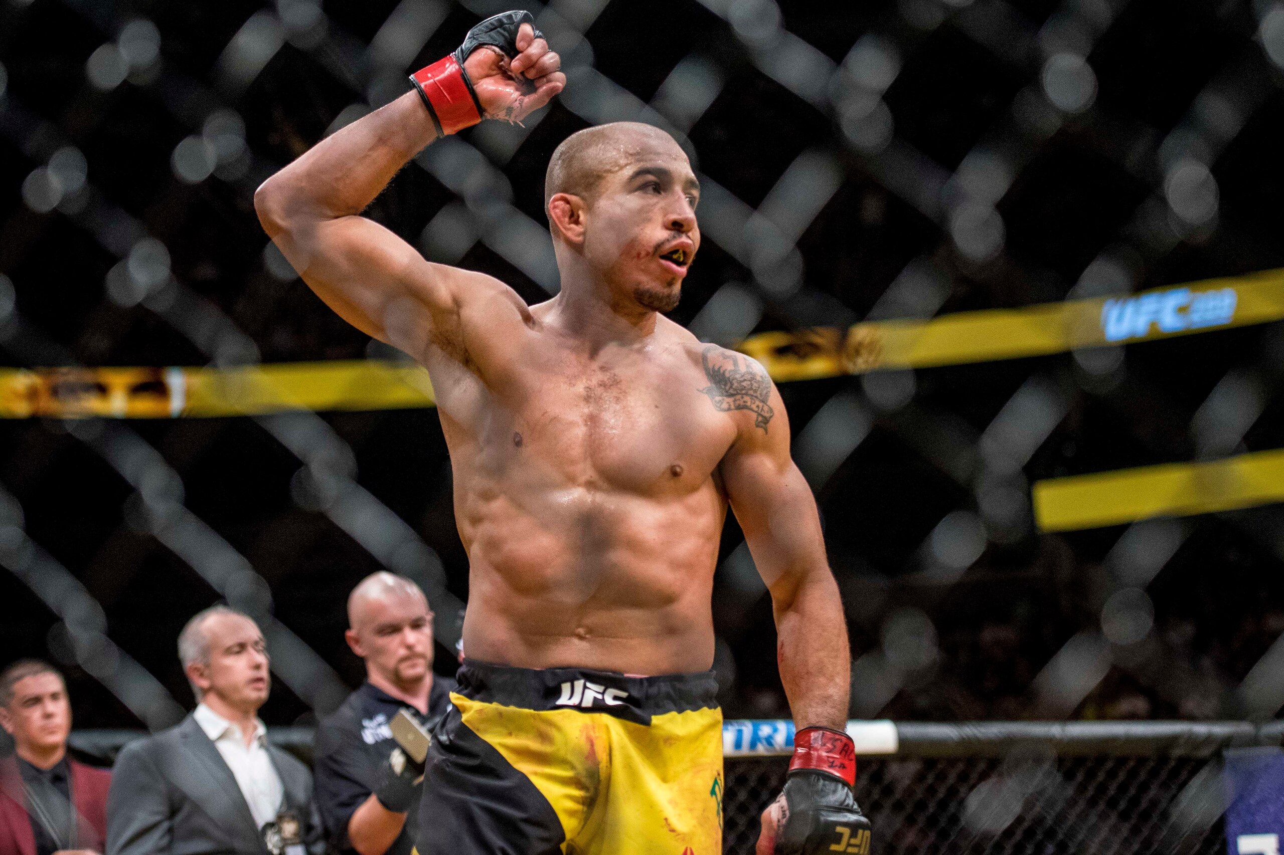 Jul 9, 2016; Las Vegas, NV, USA; Jose Aldo (red gloves) reacts to his win over Frankie Edgar (blue gloves) during UFC 200 at T-Mobile Arena. Mandatory Credit: Joshua Dahl-USA TODAY Sports Jul 9, 2016; Las Vegas, NV, USA; Jose Aldo (red gloves) reacts to his win over Frankie Edgar (blue gloves) during UFC 200 at T-Mobile Arena. Mandatory Credit: Joshua Dahl-USA TODAY Sports
