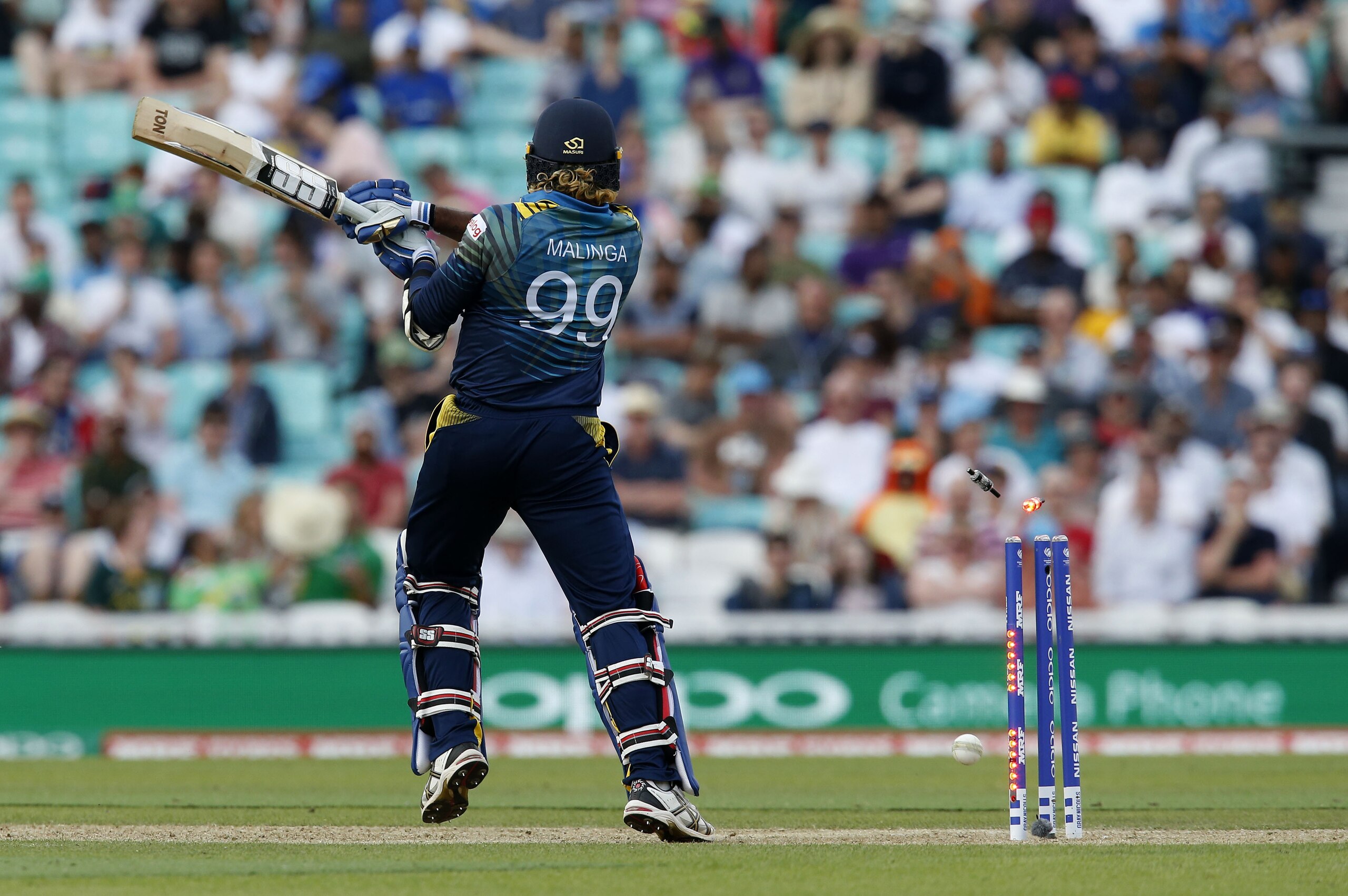 Sri Lankas Lasith Malinga is bowled by South Africas Kagiso Rabada for one run during the ICC Champions Trophy match between South Africa and Sri Lanka at The Oval in London on June 3, 2017. / AFP PHOTO / Ian KINGTON / RESTRICTED TO EDITORIAL USE        (