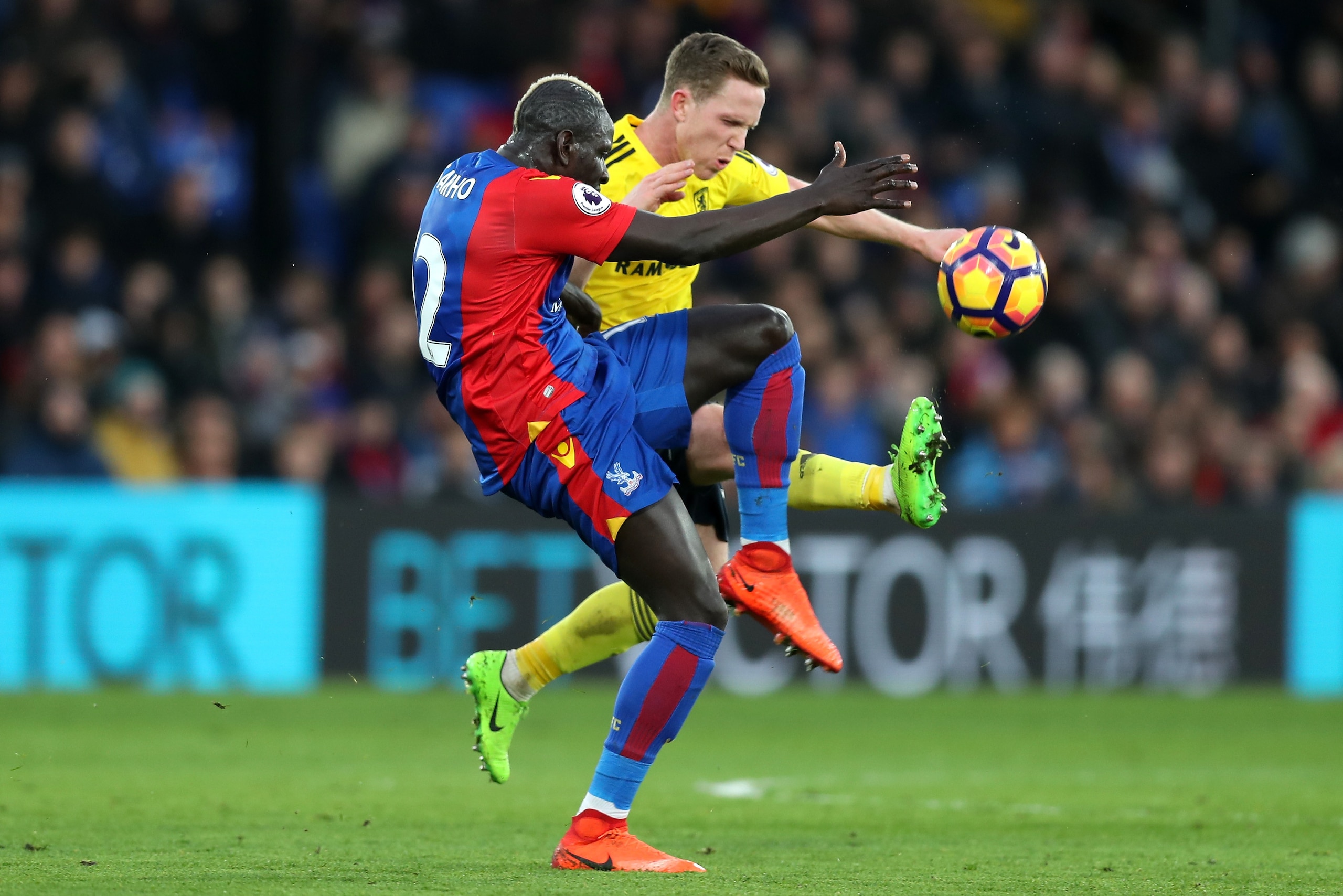 LONDON, ENGLAND - FEBRUARY 25: Mamadou Sakho of Crystal Palace (L) and Adam Forshaw of Middlesbrough (R) battle for possession during the Premier League match between Crystal Palace and Middlesbrough at Selhurst Park on February 25, 2017 in London, Englan