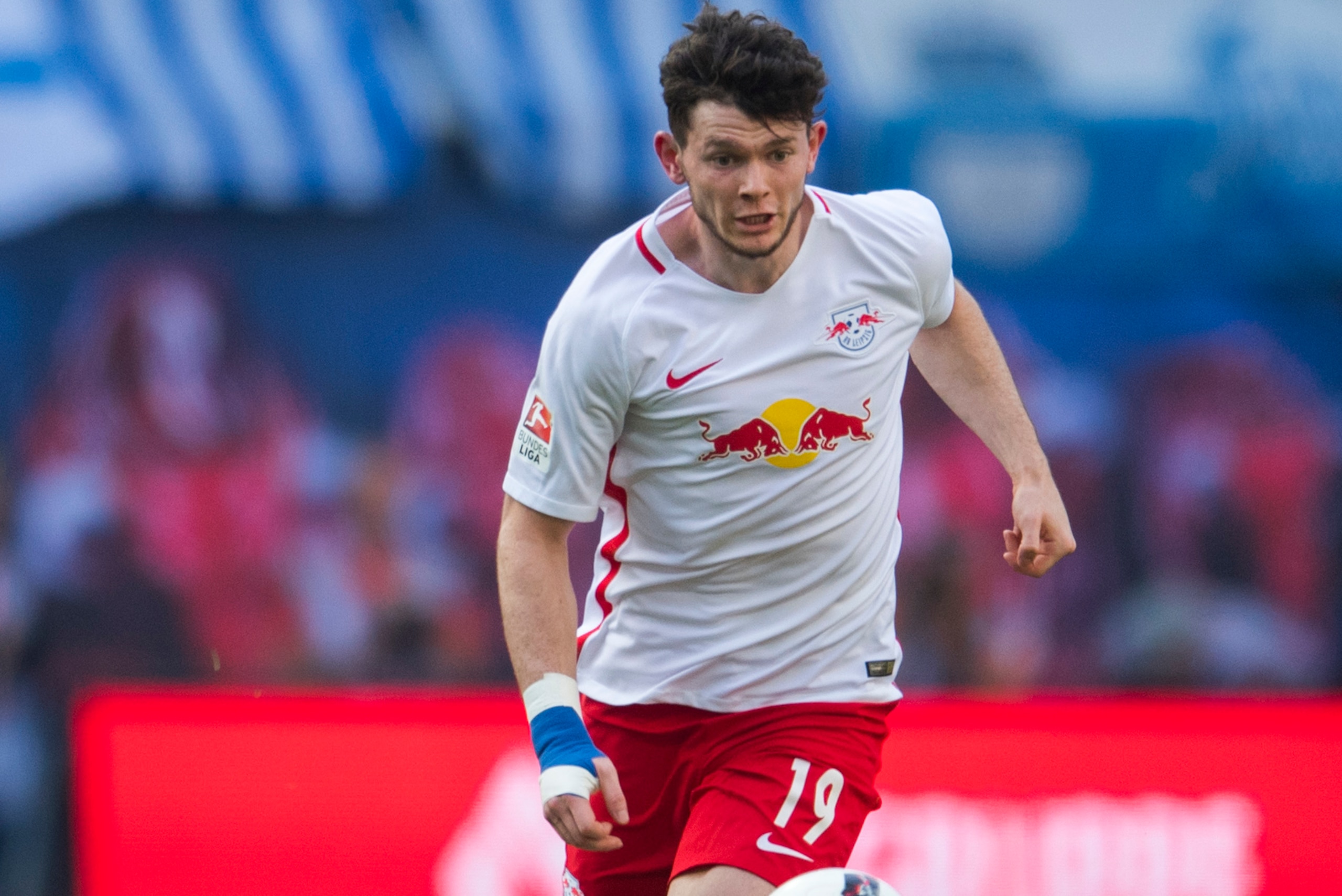 Leipzig's Scottish midfielder Oliver Burke plays the ball during the German First division Bundesliga football match between RB Leipzig and SV Darmstadt 98 in Leipzig, on April 1, 2017. / AFP PHOTO / ROBERT MICHAEL / RESTRICTIONS: DURING MATCH TIME: DFL R