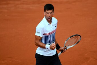 Serbia's Novak Djokovic celebrates after winning against Argentina's Diego Schwartzman during their tennis match at the Roland Garros 2017 French Open on June 2, 2017 in Paris.  / AFP PHOTO / Lionel Bonaventure        (Photo credit should read LIONEL BONA