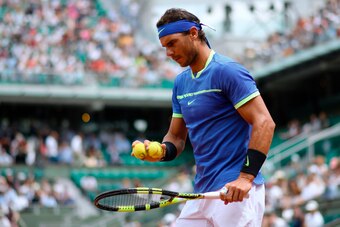 Spain's Rafael Nadal prepares to serve to Georgia's Nikoloz Basilashvili during their tennis match at the Roland Garros 2017 French Open on June 2, 2017 in Paris.  / AFP PHOTO / Lionel Bonaventure        (Photo credit should read LIONEL BONAVENTURE/AFP/Ge