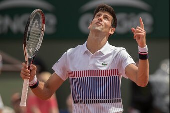 May 29, 2017; Paris, France; Novak Djokovic (SRB) reacts during his match against Marcel Granollers (ESP) (not pictured) on day two of the 2017 French Open tennis tournament at Stade Roland Garros. Mandatory Credit: Susan Mullane-USA TODAY Sports