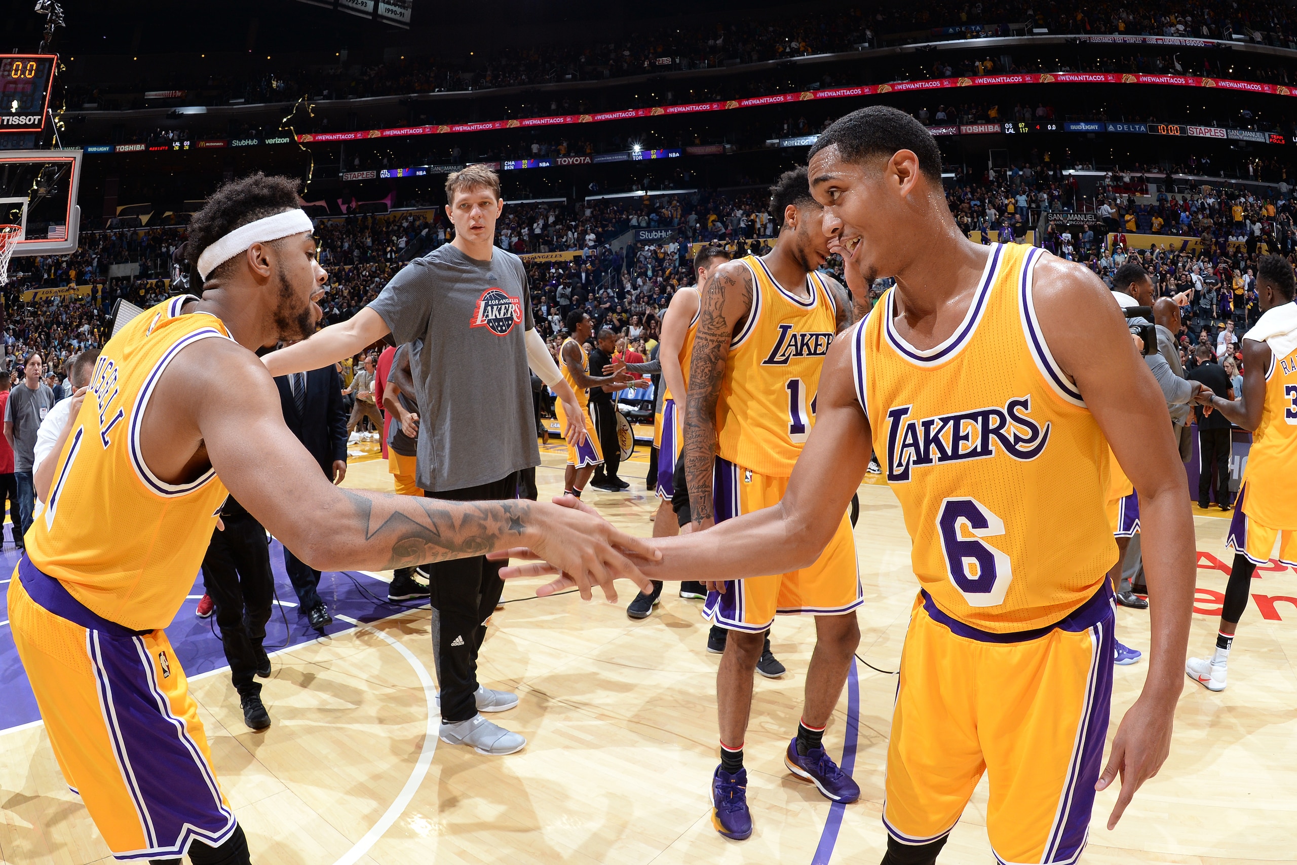 LOS ANGELES, CA - NOVEMBER 04:  D'Angelo Russell #1 and Jordan Clarkson #6 of the Los Angeles Lakers shake hands during warm ups before the game against the Golden State Warriors on November 4, 2016 at STAPLES Center in Los Angeles, California. NOTE TO US