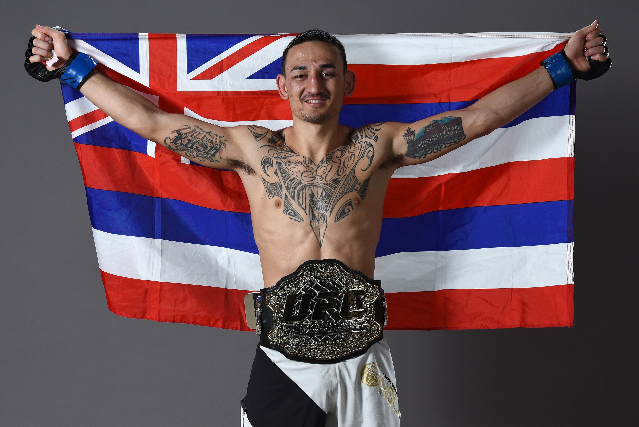 RIO DE JANEIRO, BRAZIL - JUNE 03:  Max Holloway poses for a portrait backstage after his TKO victory over Jose Aldo during the UFC 212 event at Jeunesse Arena on June 3, 2017 in Rio de Janeiro, Brazil. (Photo by Mike Roach/Zuffa LLC/Zuffa LLC via Getty Im