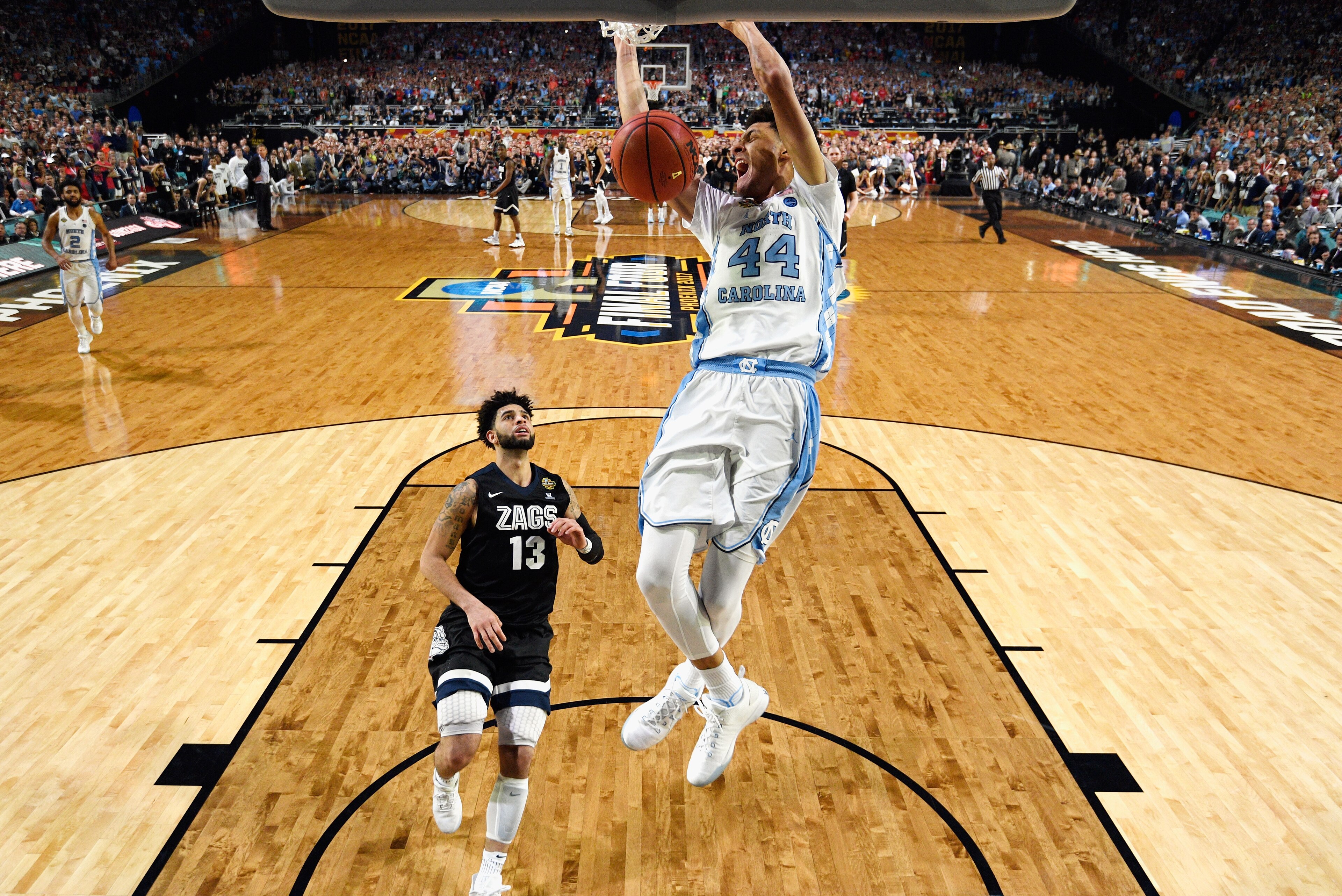 GLENDALE, AZ - APRIL 03: Justin Jackson #44 of the North Carolina Tar Heels dunks late in the second half against Josh Perkins #13 of the Gonzaga Bulldogs during the 2017 NCAA Men's Final Four National Championship game at University of Phoenix Stadium on