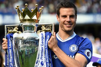 LONDON, ENGLAND - MAY 21:  Cesar Azpilicueta of Chelsea holds the Premier League Trophy following the Premier League match between Chelsea and Sunderland at Stamford Bridge on May 21, 2017 in London, England.  (Photo by Michael Regan/Getty Images)