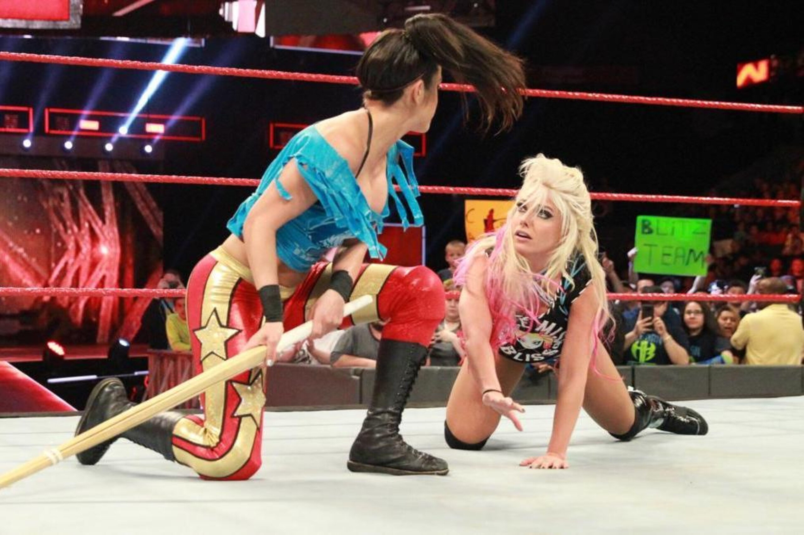 Bayley considers using a kendo stick on Alexa Bliss on Raw.