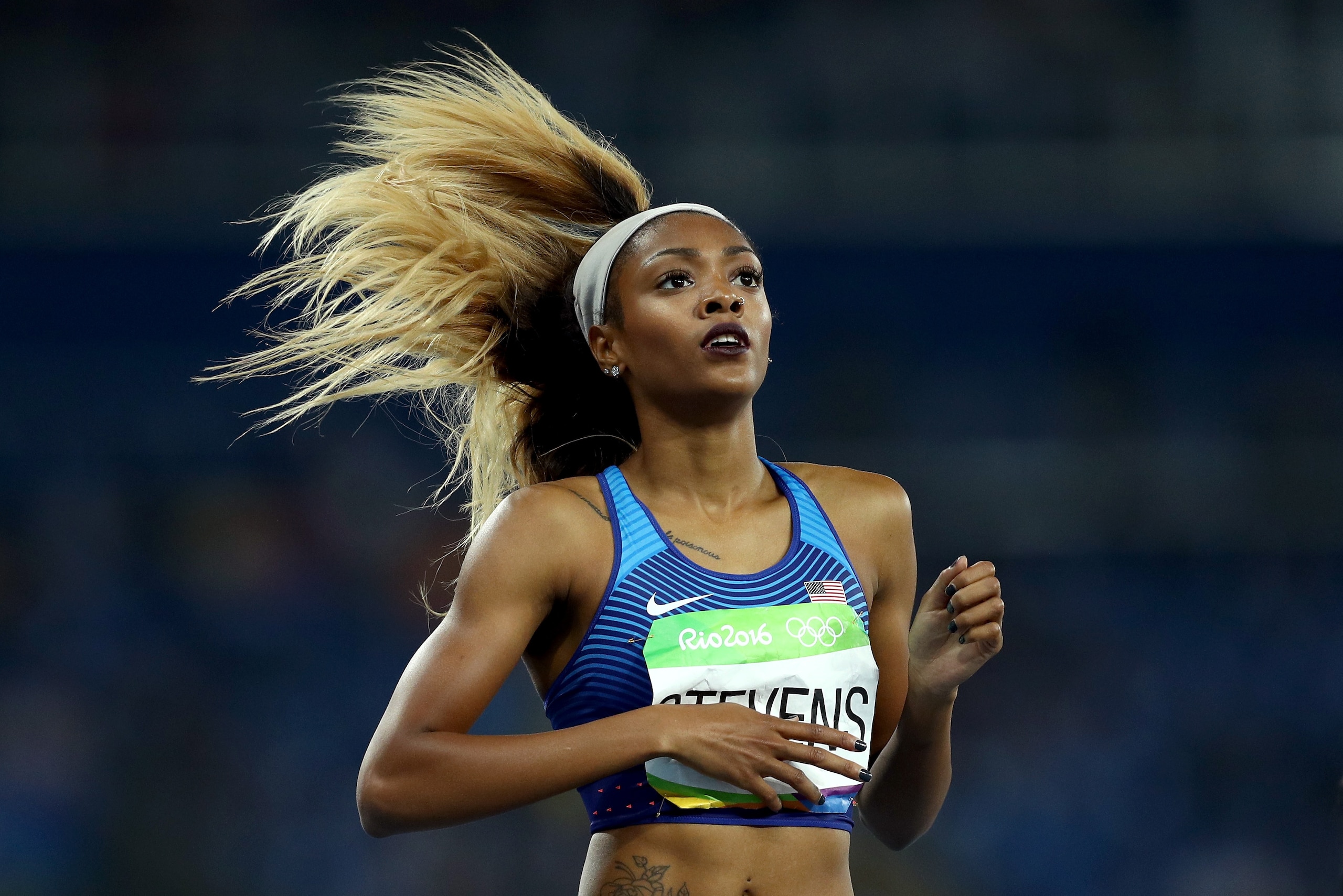 RIO DE JANEIRO, BRAZIL - AUGUST 16:  Deajah Stevens of the United States reacts during the Women's 200m Semifinals on Day 11 of the Rio 2016 Olympic Games at the Olympic Stadium on August 16, 2016 in Rio de Janeiro, Brazil.  (Photo by Patrick Smith/Getty
