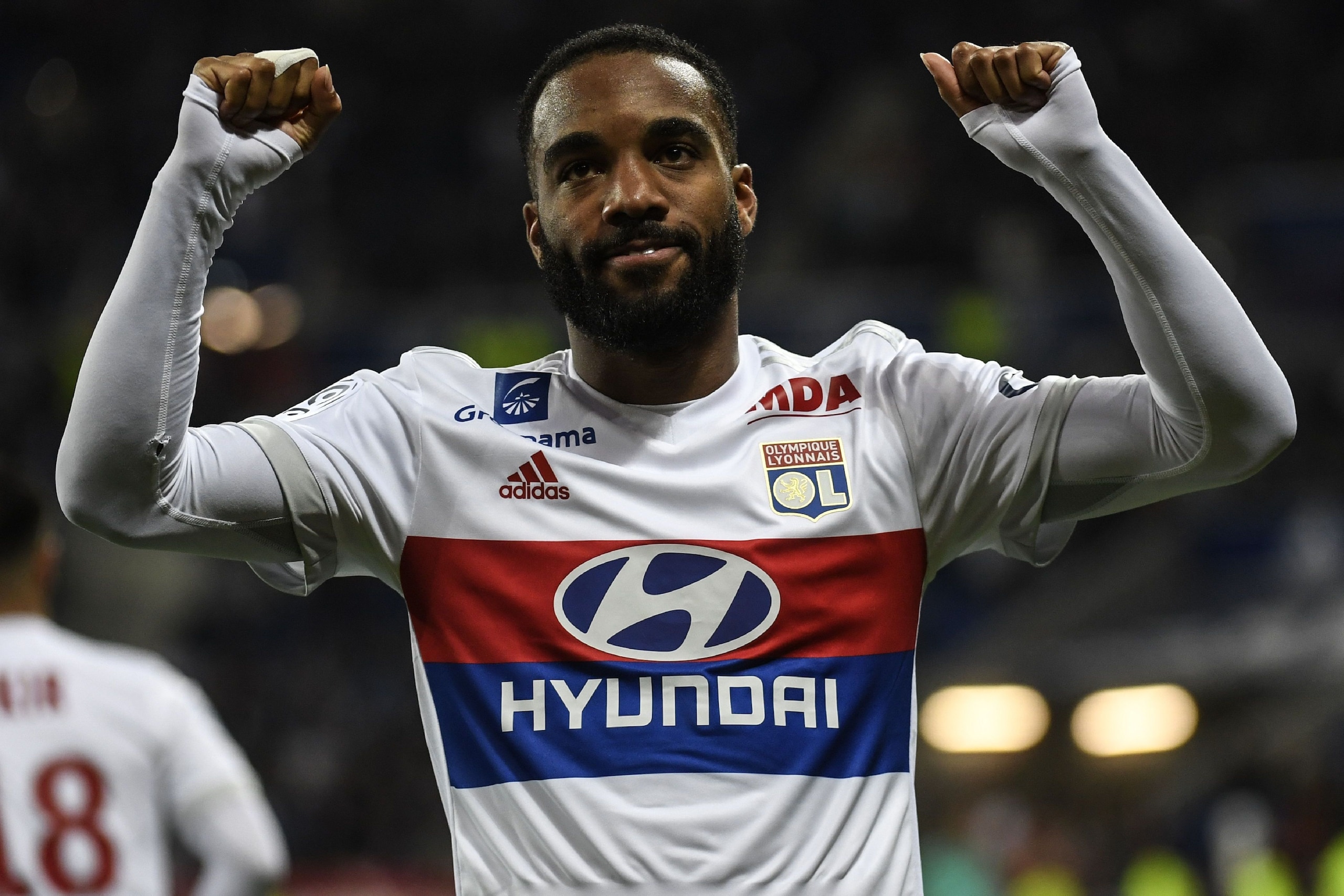 Lyon's French forward Alexandre Lacazette reacts after scoring during the French L1 football match between Lyon (OL) and Nice (OGCN) on May 20, 2017, at the Parc Olympique Lyonnais stadium in Decines-Charpieu near Lyon, central-eastern  France. / AFP PHOT