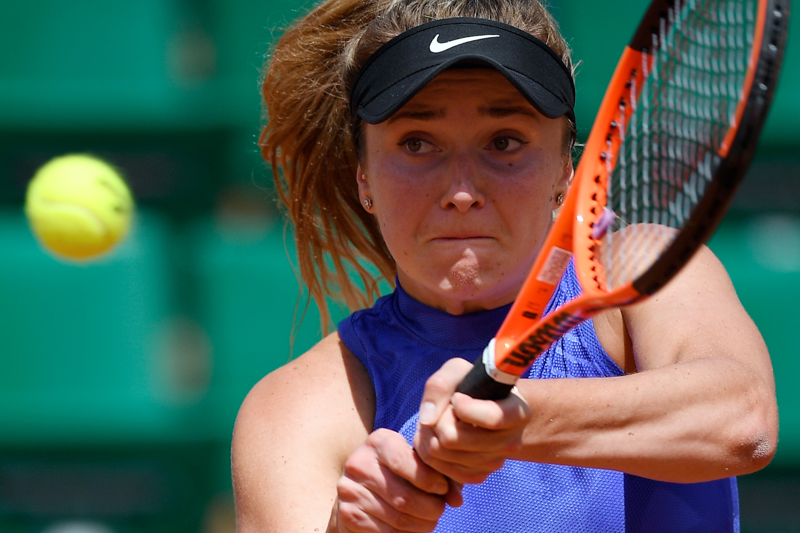 Ukraine's Elina Svitolina returns the ball to Croatia's Petra Martic during their tennis match at the Roland Garros 2017 French Open on June 5, 2017 in Paris. / AFP PHOTO / Lionel BONAVENTURE (Photo credit should read LIONEL BONAVENTURE/AFP/Getty Ukraine's Elina Svitolina returns the ball to Croatia's Petra Martic during their tennis match at the Roland Garros 2017 French Open on June 5, 2017 in Paris. / AFP PHOTO / Lionel BONAVENTURE (Photo credit should read LIONEL BONAVENTURE/AFP/Getty
