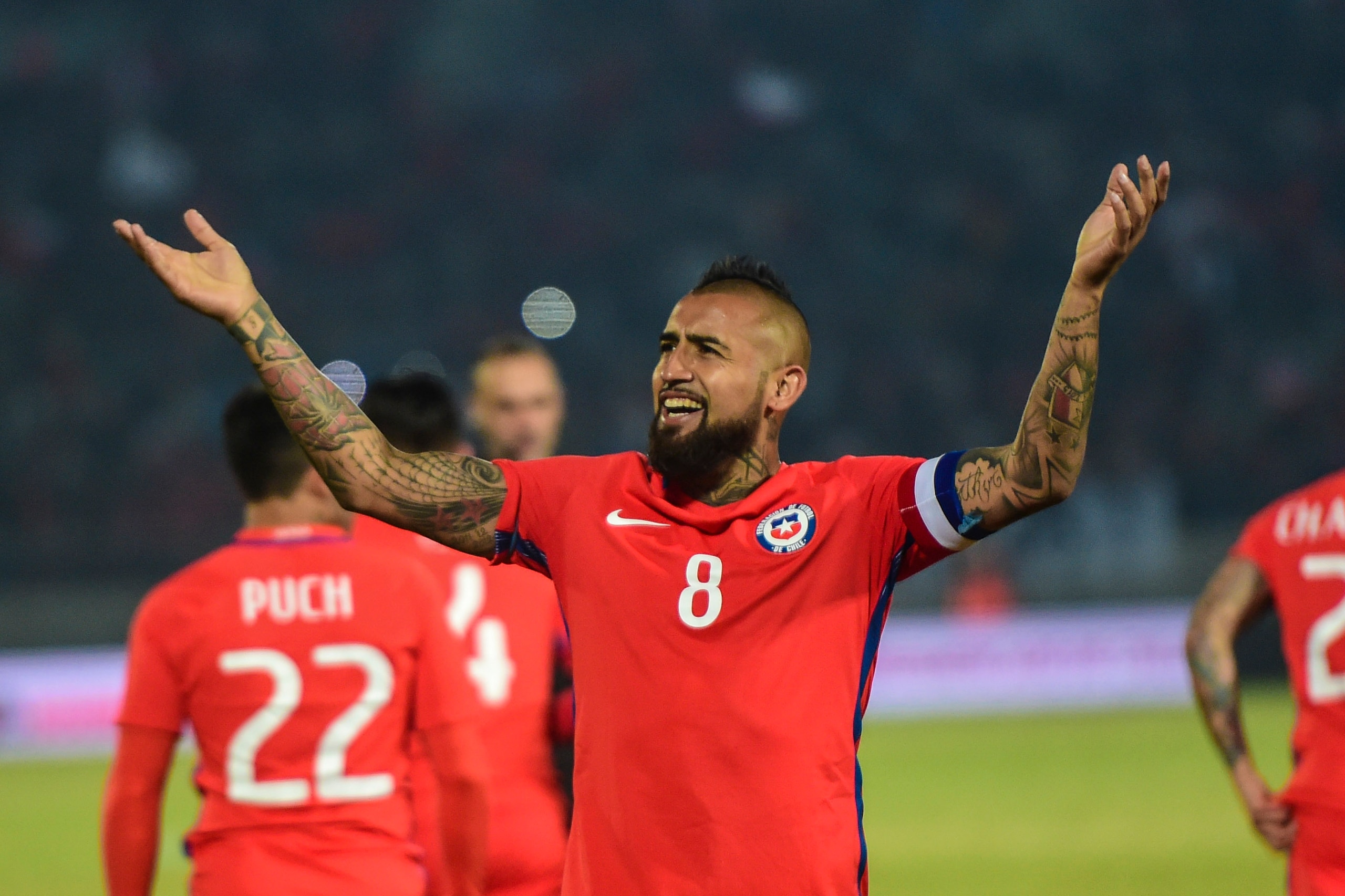 Chile's Arturo Vidal celebrates his goal against Burkina Faso during a friendly match for the FIFA Confederations Cup Russia 2017, in Santiago, on June 2, 2017. / AFP PHOTO / MARTIN BERNETTI (Photo credit should read MARTIN BERNETTI/AFP/Getty Image Chile's Arturo Vidal celebrates his goal against Burkina Faso during a friendly match for the FIFA Confederations Cup Russia 2017, in Santiago, on June 2, 2017. / AFP PHOTO / MARTIN BERNETTI (Photo credit should read MARTIN BERNETTI/AFP/Getty Image
