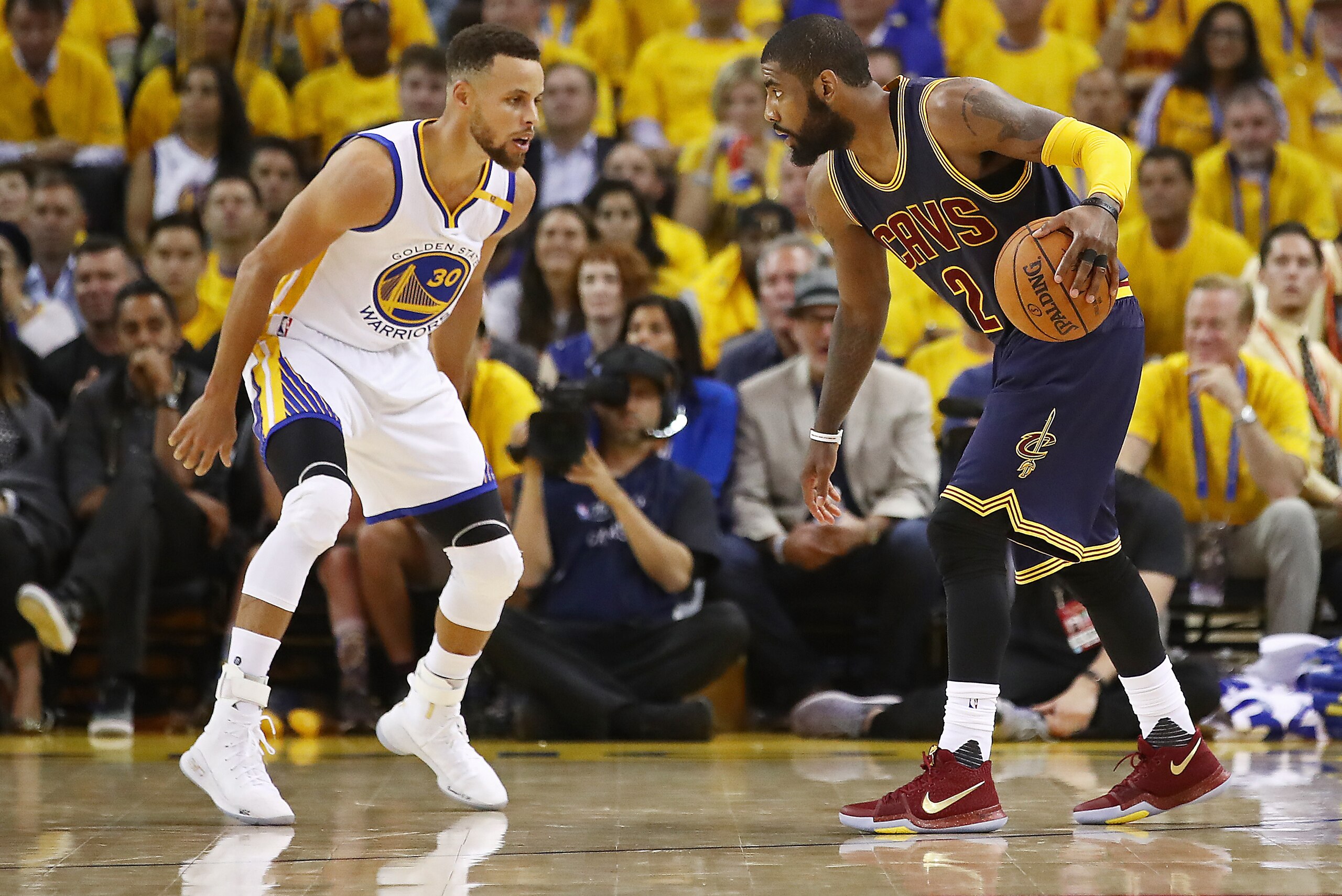 OAKLAND, CA - JUNE 01: Kyrie Irving #2 of the Cleveland Cavaliers is defended by Stephen Curry #30 of the Golden State Warriors in Game 1 of the 2017 NBA Finals at ORACLE Arena on June 1, 2017 in Oakland, California. NOTE TO USER: User expressly acknowled