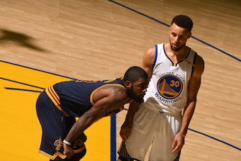 OAKLAND, CA - JUNE 1:  Kyrie Irving #2 of the Cleveland Cavaliers and Stephen Curry #30 of the Golden State Warriors match up in Game One of the 2017 NBA Finals on June 1, 2017 at Oracle Arena in Oakland, California. NOTE TO USER: User expressly acknowled