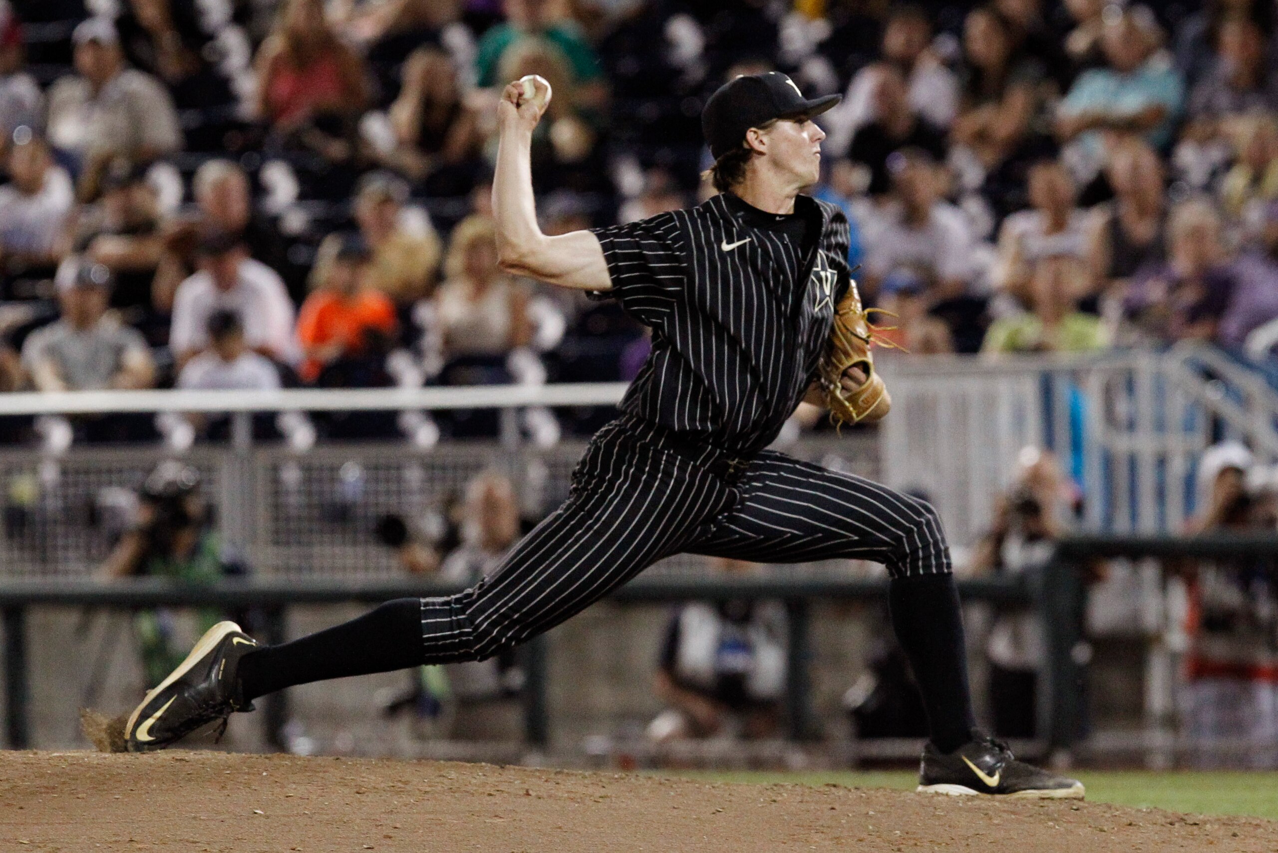 Jun 22, 2015; Omaha, NE, USA; Vanderbilt Commodores pitcher Kyle Wright (44) throws during the game against the Virginia Cavaliers in game one of the College World Series Finals at TD Ameritrade Park. Mandatory Credit: Bruce Thorson-USA TODAY Sports