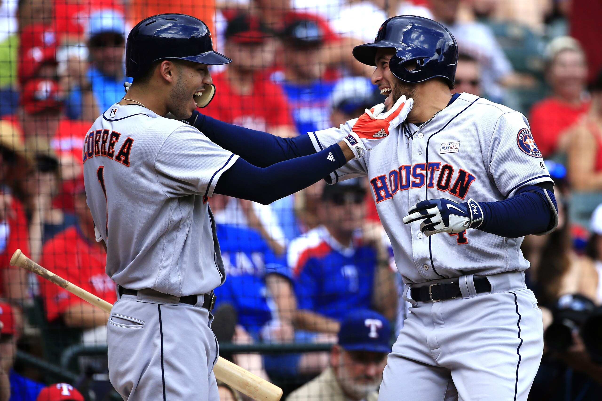 ARLINGTON, TX - JUNE 4: Carlos Correa #1 and George Springer #4 of the Houston Astros celebrate Springer's home run against the Texas Rangers during the fourth inning at Globe Life Park in Arlington on June 4, 2017 in Arlington, Texas. (Photo by Ron Jenki