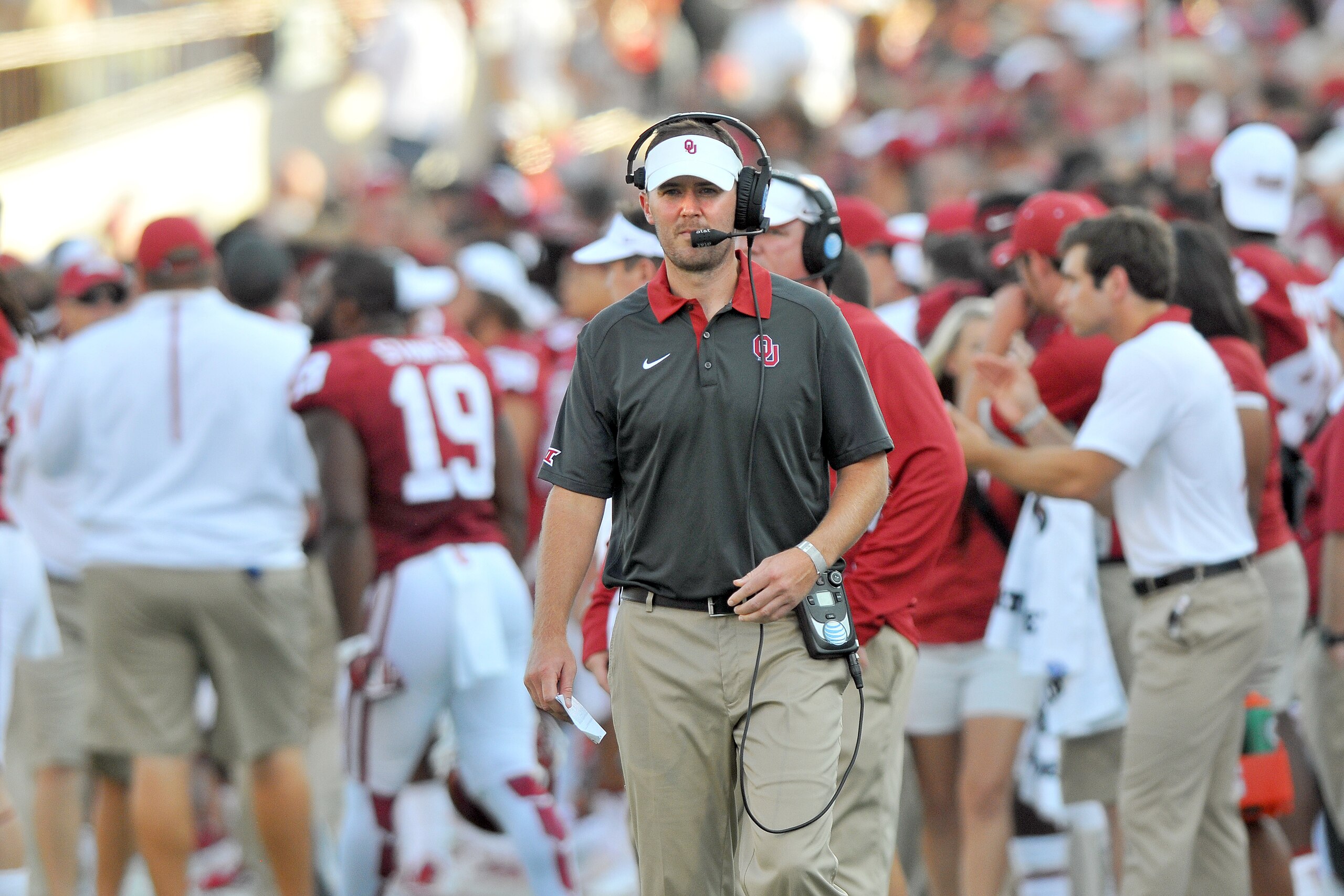 NORMAN, OK - SEPTEMBER 05: New offensive coordinator Lincoln Riley of the Oklahoma Sooners gets ready for their game against the Akron Zips at Gaylord Family Memorial Stadium on September 5, 2015 in Norman, Oklahoma. (Photo by Jackson Laizure/Getty Images