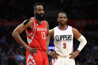 LOS ANGELES, CA - APRIL 10:  James Harden #13 of the Houston Rockets and Chris Paul #3 of the LA Clippers look on during the second  half of a game at Staples Center on April 10, 2017 in Los Angeles, California.  NOTE TO USER: User expressly acknowledges 