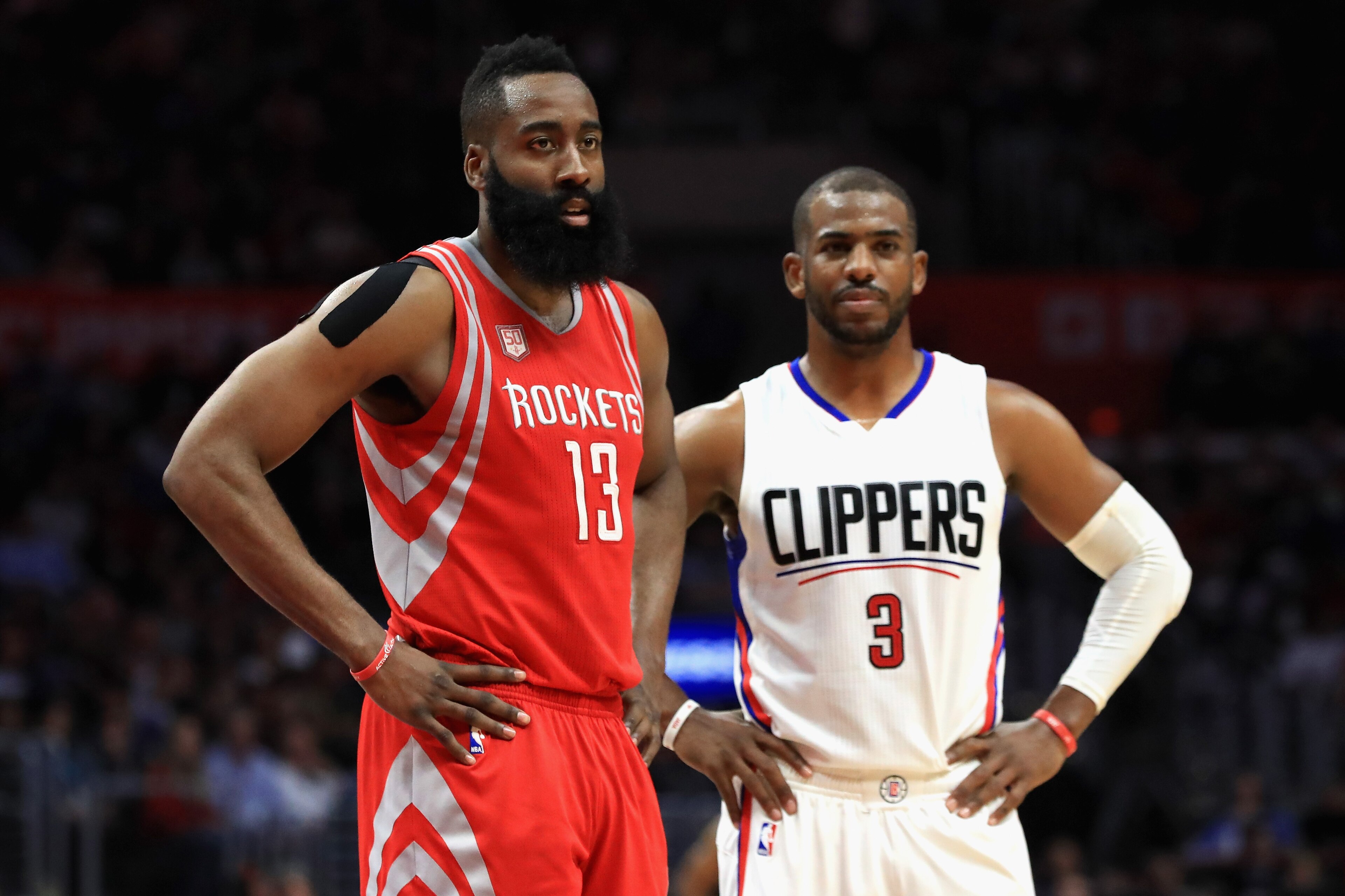 LOS ANGELES, CA - APRIL 10:  James Harden #13 of the Houston Rockets and Chris Paul #3 of the LA Clippers look on during the second  half of a game at Staples Center on April 10, 2017 in Los Angeles, California.  NOTE TO USER: User expressly acknowledges 