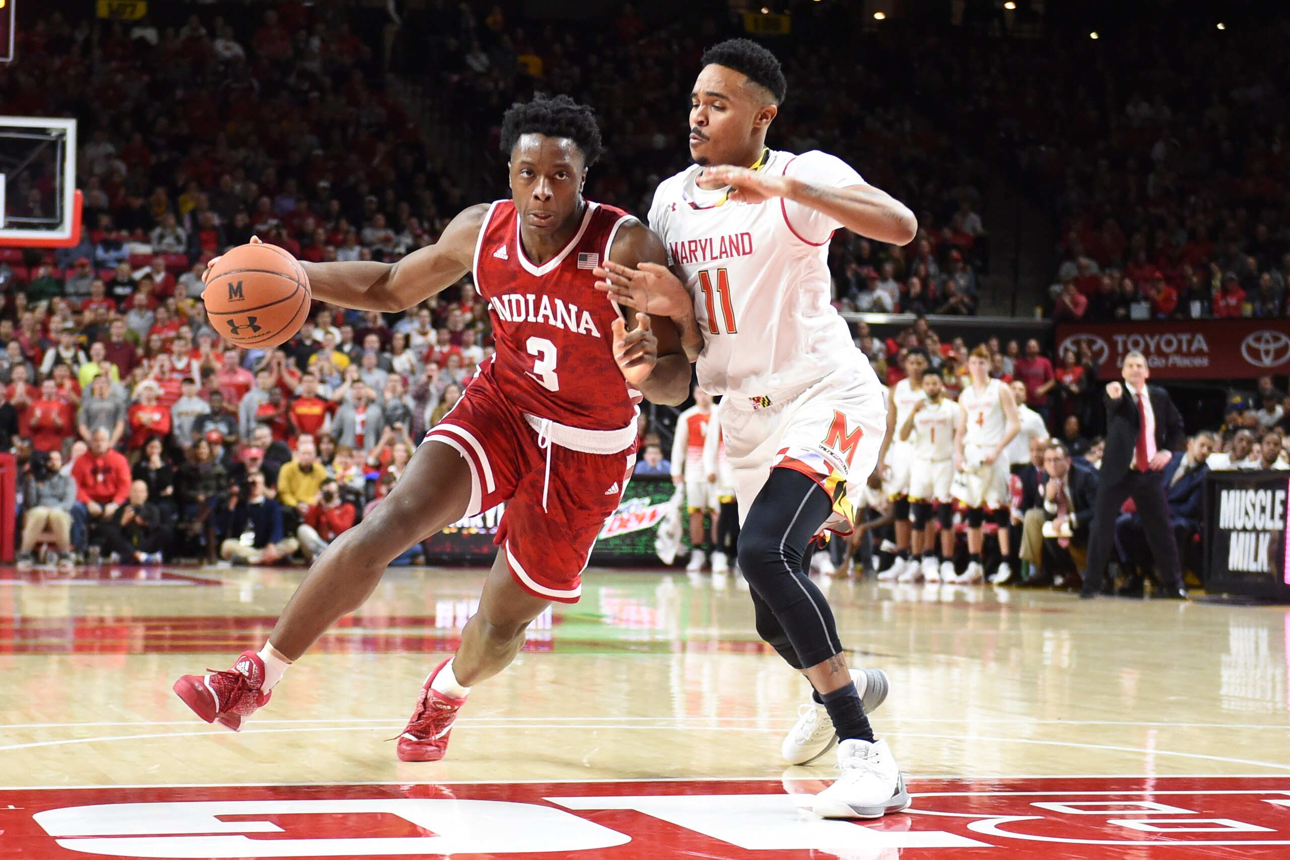 COLLEGE PARK, MD - JANUARY 10:  OG Anunoby #3 of the Indiana Hoosiers dribbles the ball past Jared Nickens #11 of the Maryland Terrapins during a college basketball game at the XFinity Center Center on January 10, 2017 in College Park, Maryland.  The Terr