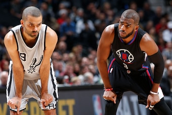 SAN ANTONIO, TX - DECEMBER 18: Tony Parker #9 of the San Antonio Spurs and Chris Paul #3 of the Los Angeles Clippers are seen during the game on December 18, 2015 at the AT&T Center in San Antonio, Texas. NOTE TO USER: User expressly acknowledges and agre