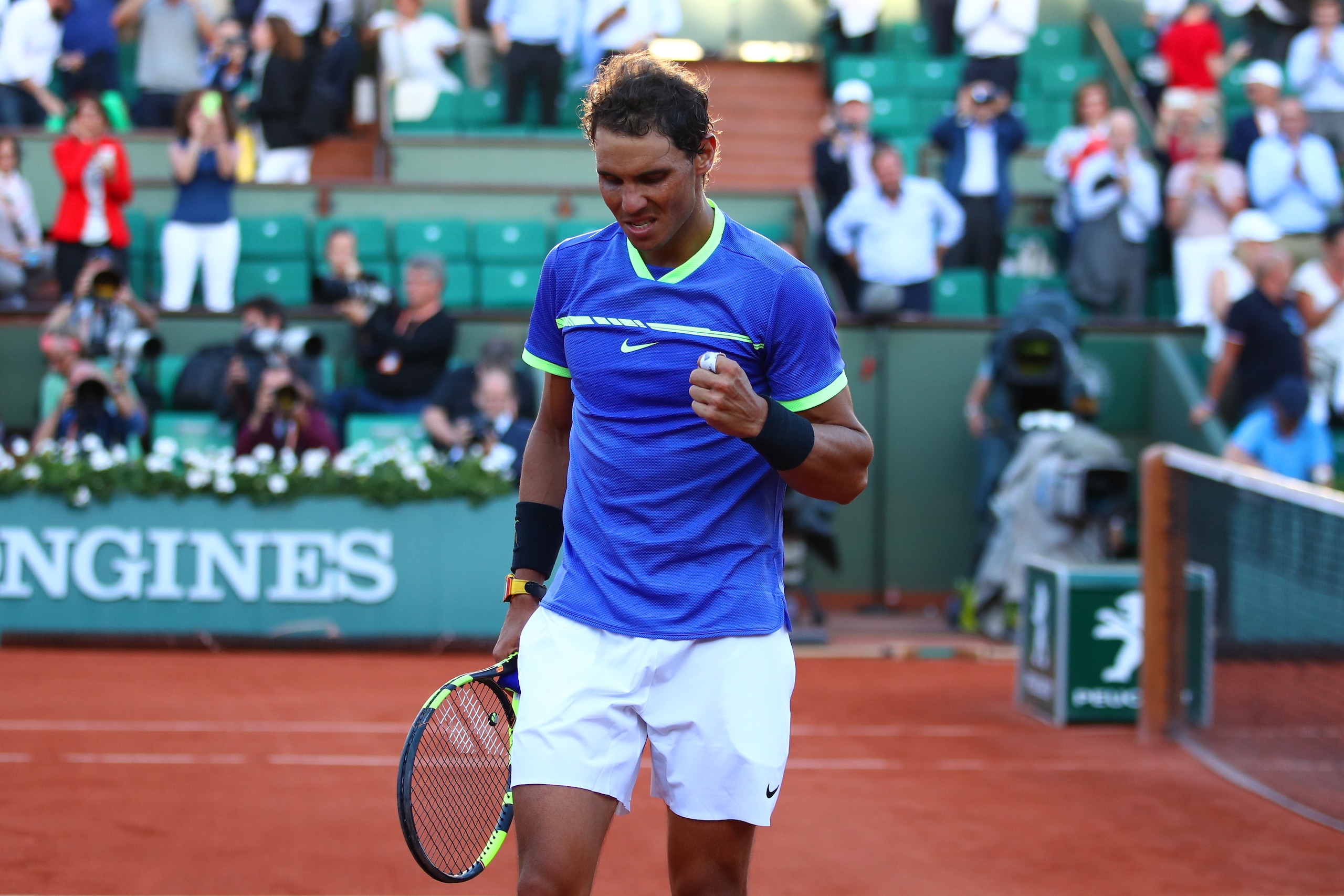 PARIS, FRANCE - JUNE 09:  Rafael Nadal of Spain celebrates victory during the men's singles semi final match against Dominic Thiem of Austria on day thirteen of the 2017 French Open at Roland Garros on June 9, 2017 in Paris, France.  (Photo by Clive Bruns