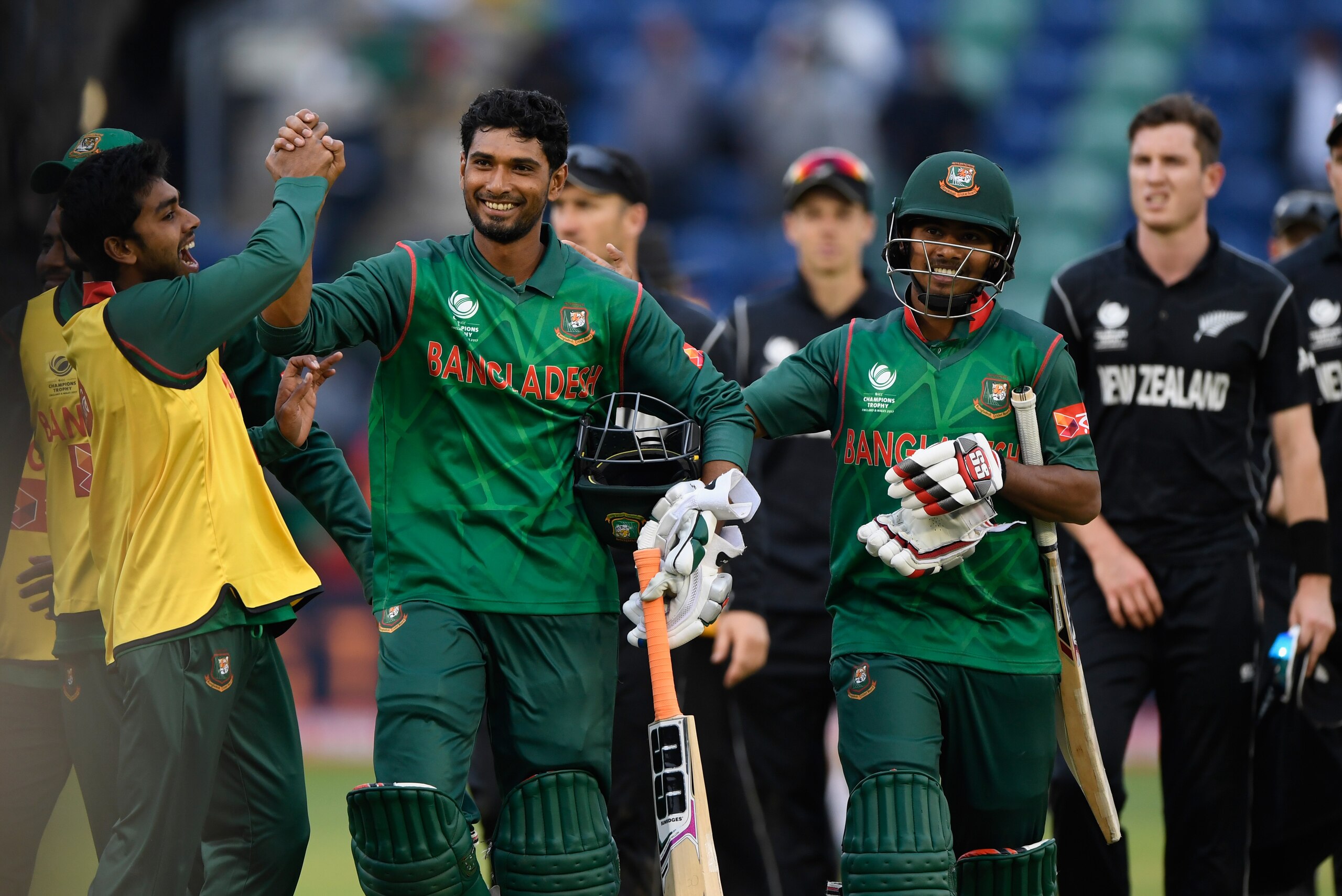CARDIFF, WALES - JUNE 09:  Bangladesh batsman Mohammad Mahmudullah celebrates with team mates after hitting the winning runs during the ICC Champions Trophy match between New Zealand and Bangladesh at SWALEC Stadium on June 9, 2017 in Cardiff, Wales.  (Ph