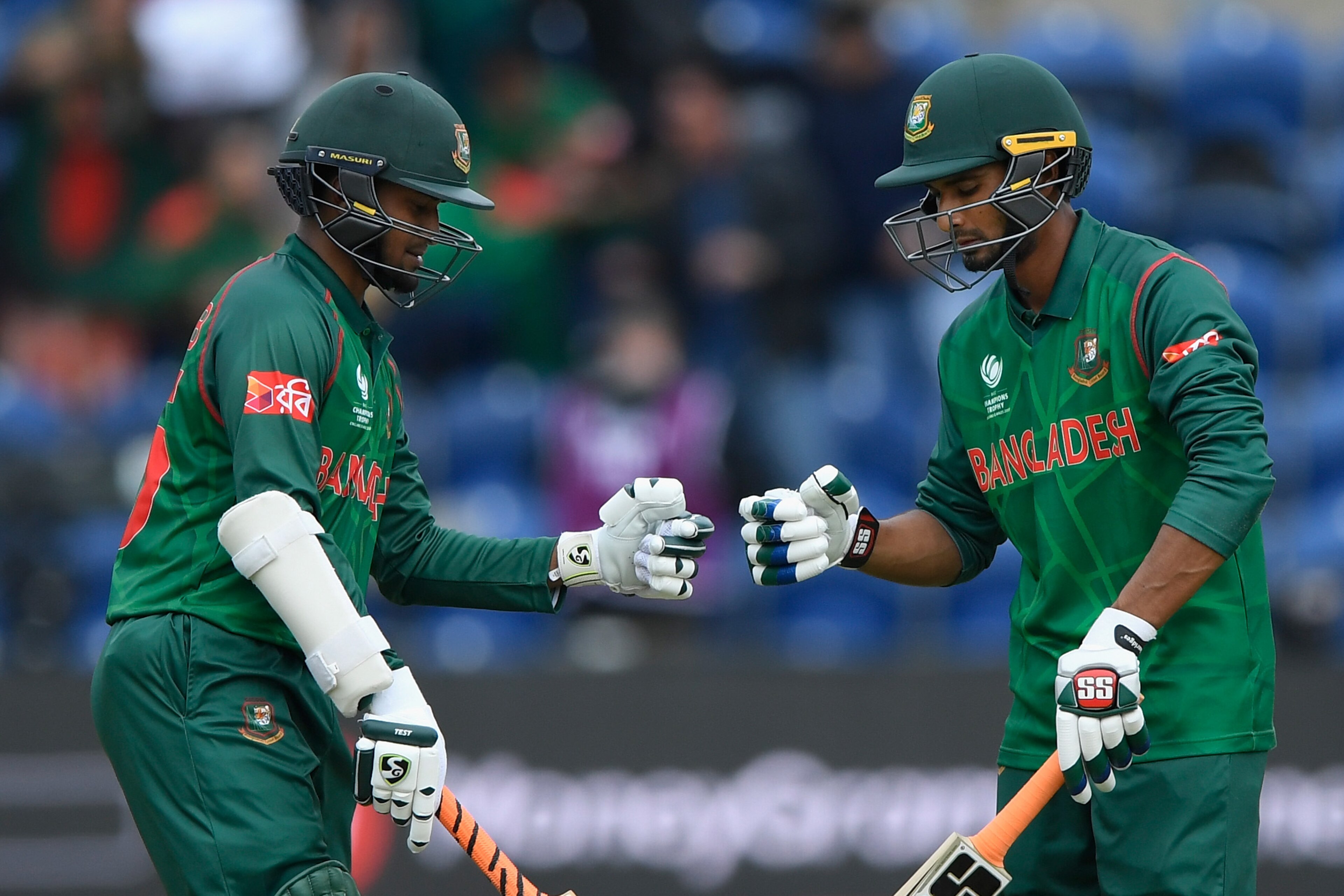 CARDIFF, WALES - JUNE 09:  Bangladesh batsmen Shakib Al Hasan (l) and Mohammad Mahmudullah punch gloves during their partnership during the ICC Champions Trophy match between New Zealand and Bangladesh at SWALEC Stadium on June 9, 2017 in Cardiff, Wales. 