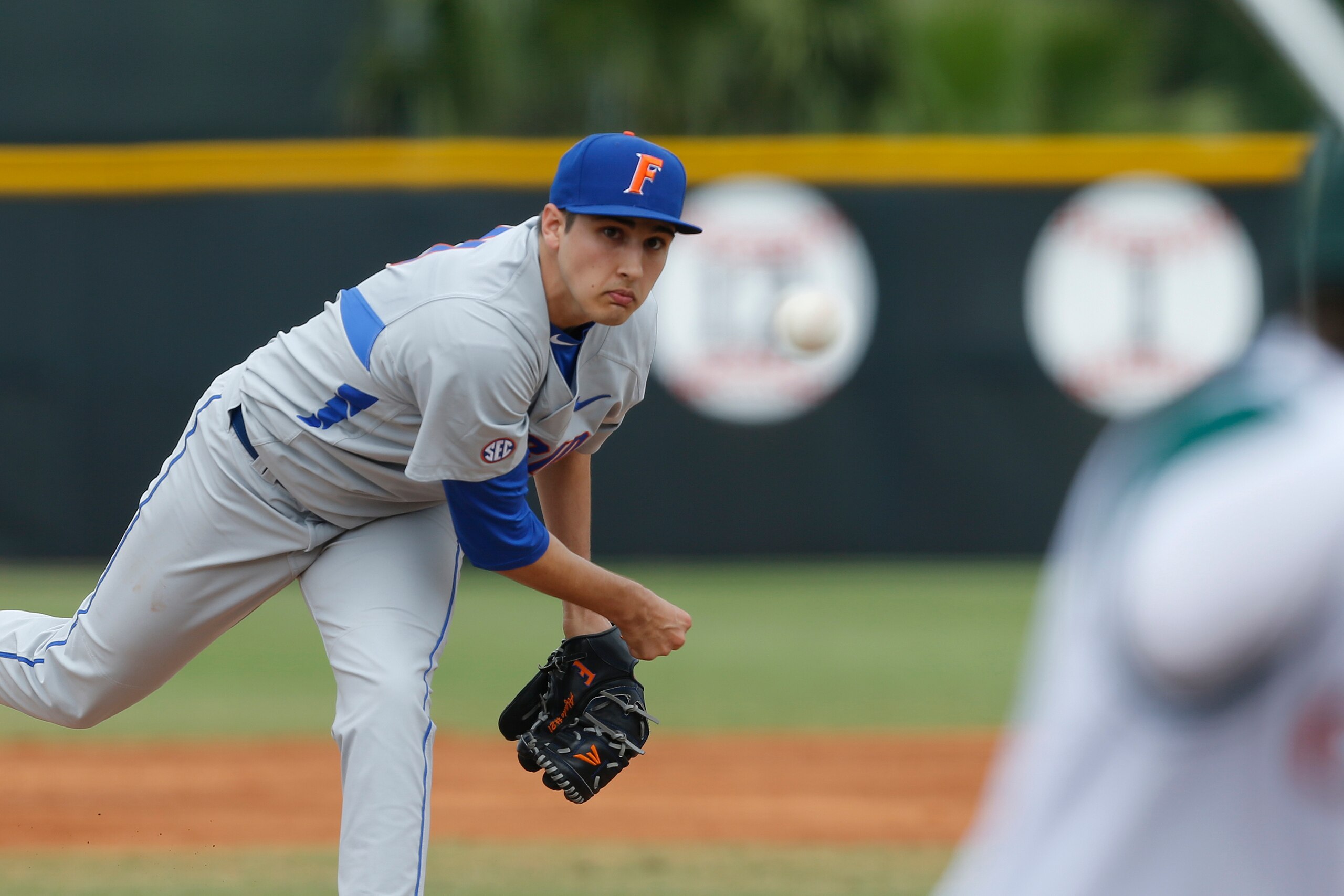 CORAL GABLES, FL - FEBRUARY 28: Alex Faedo #21 of the Florida Gators throws the ball against the Miami Hurricanes on February 28, 2016 at Alex Rodriguez Park at Mark Light Field in Coral Gables, Florida. Florida defeated Miami 7-3. (Photo by Joel Auerbach