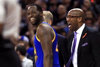 CLEVELAND, OH - JUNE 09: Draymond Green #23 of the Golden State Warriors and assistant coach Mike Brown react after a foul call in the third quarter against the Cleveland Cavaliers in Game 4 of the 2017 NBA Finals at Quicken Loans Arena on June 9, 2017 in