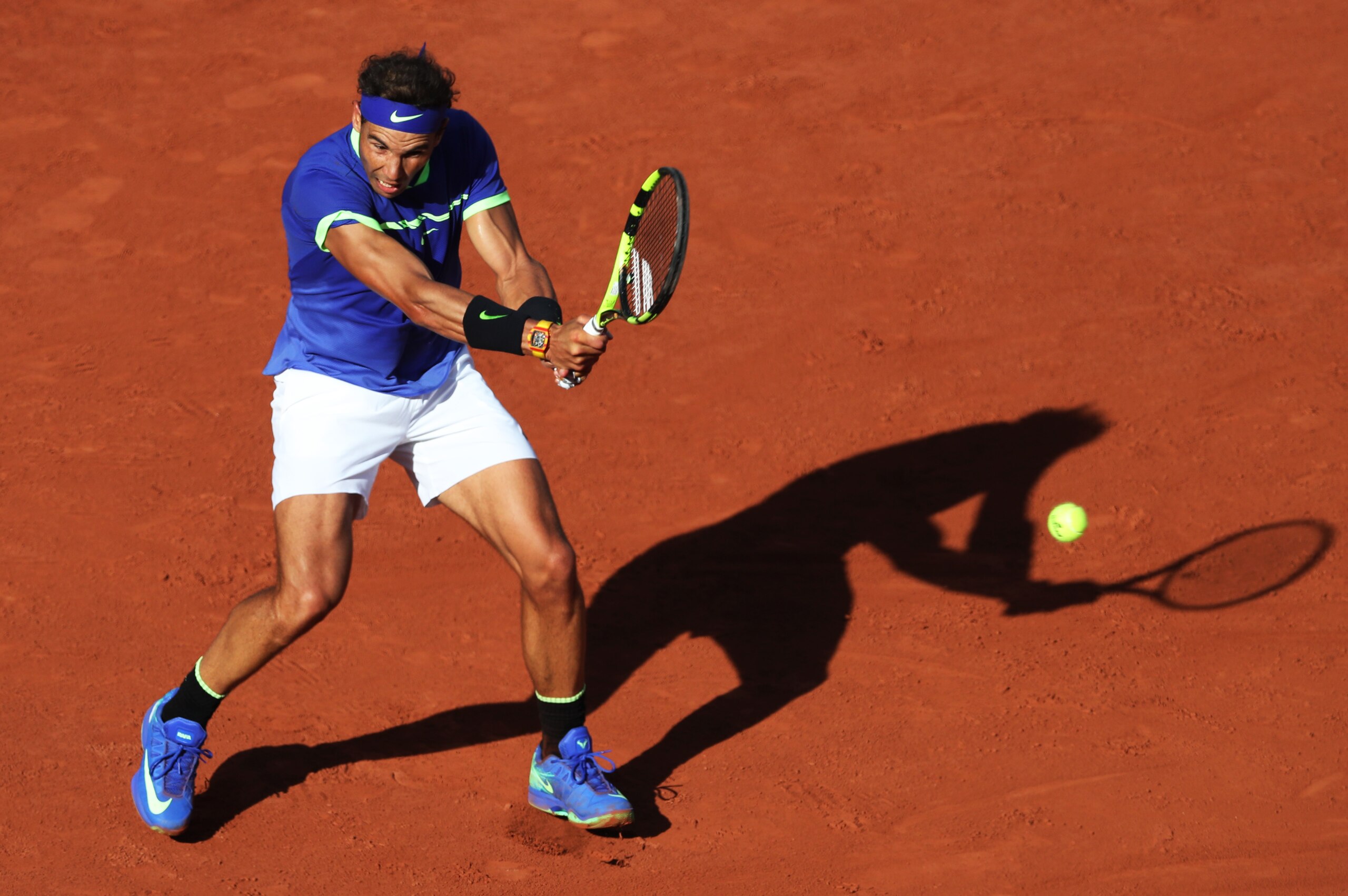 PARIS, FRANCE - JUNE 09: Rafael Nadal of Spain plays a backhand shot during his semi-final match with Dominic Thiem of Austria, on day thirteen at Roland Garros on June 9, 2017 in Paris, France. (Photo by Ian MacNicol/Getty Images)