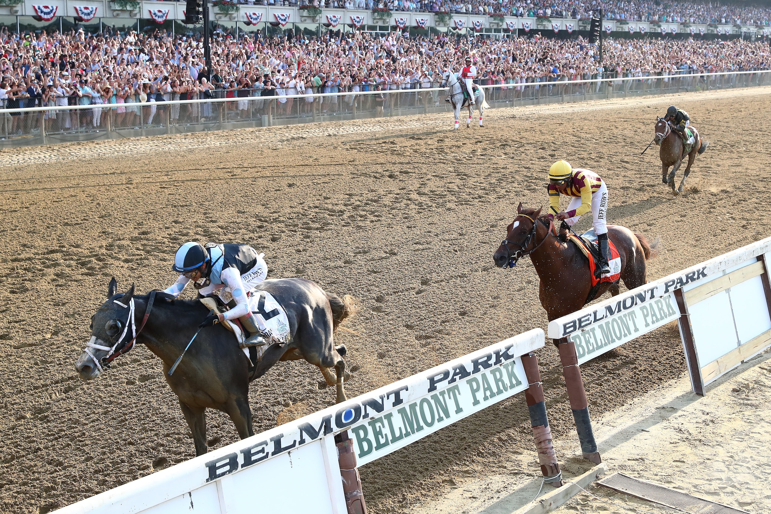 ELMONT, NY - JUNE 10:  Jose Otriz is up on Tapwrit leading to victory as Irish War Cry with Rajiv Maragh up is second in The 149th running of the Belmont Stakes at Belmont Park on June 10, 2017 in Elmont, New York.  (Photo by Al Bello/Getty Images)