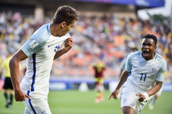 England's forward Dominic Calvert-Lewin (L) celebrates a goal during the U-20 World Cup final football match between England and Venezuela in Suwon on June 11, 2017.  / AFP PHOTO / KIM DOO-HO        (Photo credit should read KIM DOO-HO/AFP/Getty Images)