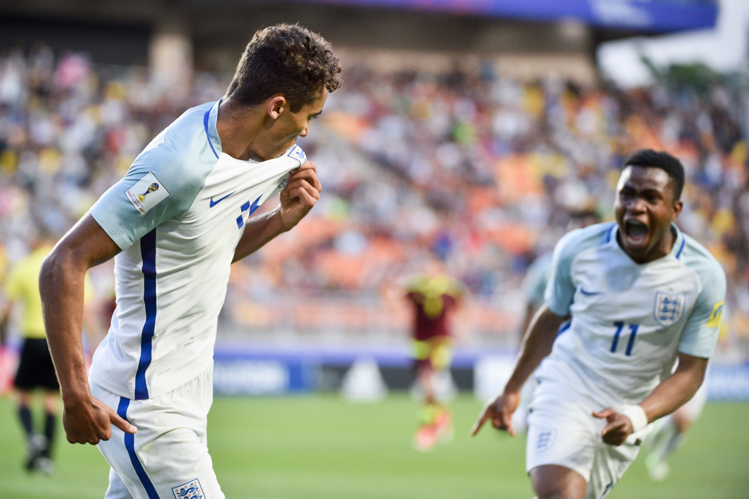 England's forward Dominic Calvert-Lewin (L) celebrates a goal during the U-20 World Cup final football match between England and Venezuela in Suwon on June 11, 2017.  / AFP PHOTO / KIM DOO-HO        (Photo credit should read KIM DOO-HO/AFP/Getty Images)