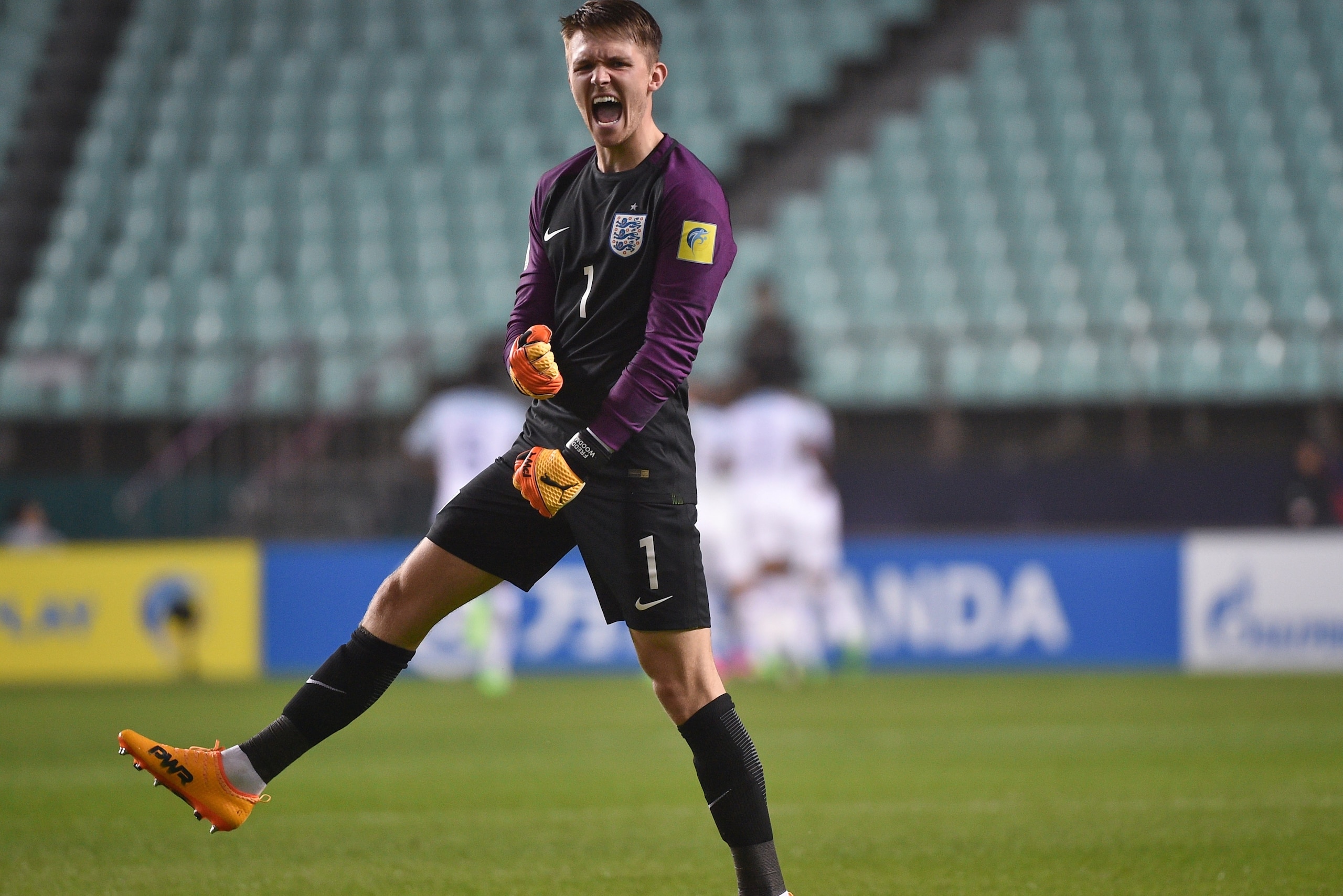 England's goalkeeper Freddie Woodman reacts after teammate Ademola Lookman scored during their U-20 World Cup round of 16 football match between England and Costa Rica in Jeonju on May 31, 2017. / AFP PHOTO / KIM DOO-HO        (Photo credit should read KI