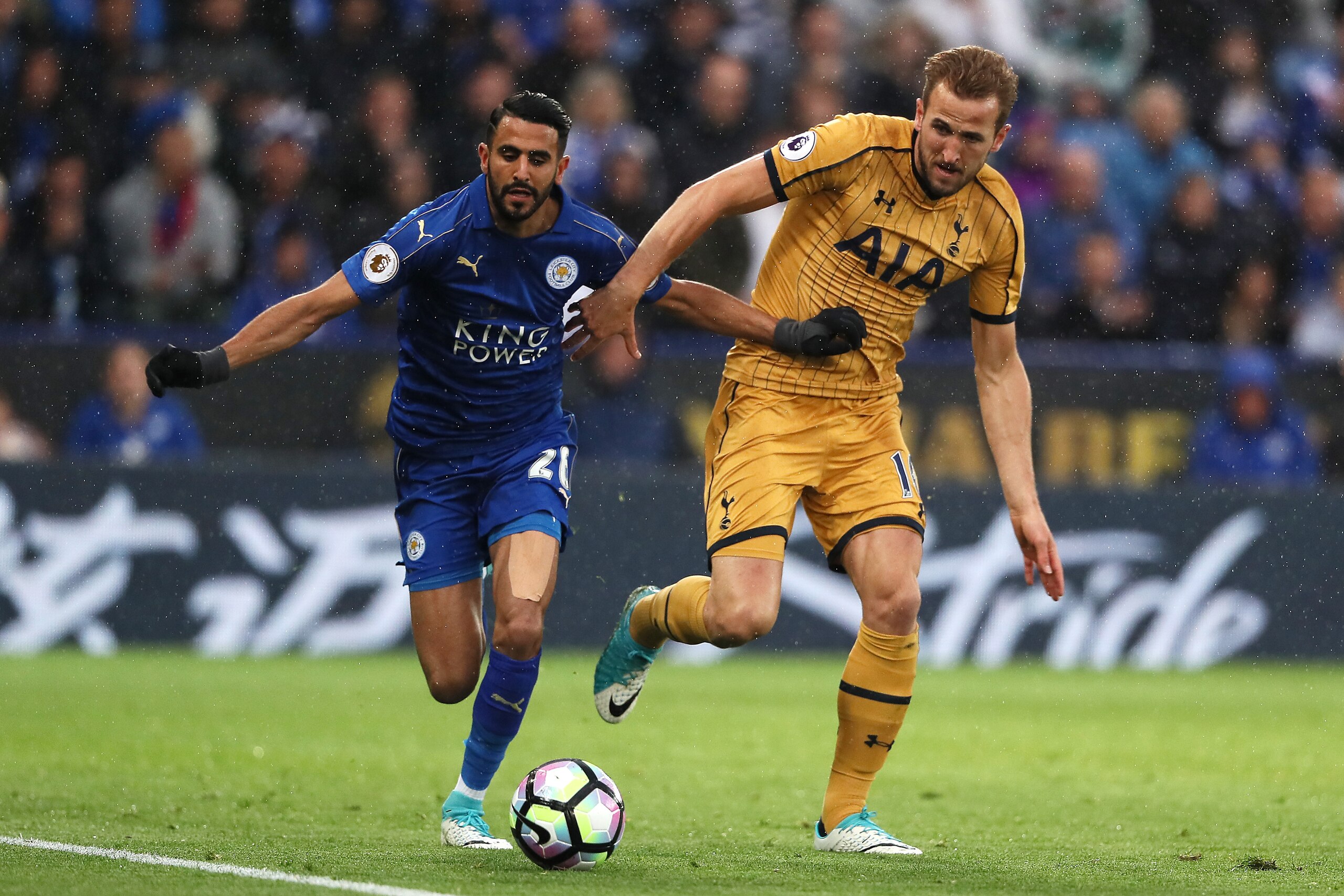 LEICESTER, ENGLAND - MAY 18:  Riyad Mahrez of Leicester City competes with Harry Kane of Tottenham Hotspur during the Premier League match between Leicester City and Tottenham Hotspur at The King Power Stadium on May 18, 2017 in Leicester, England.  (Phot