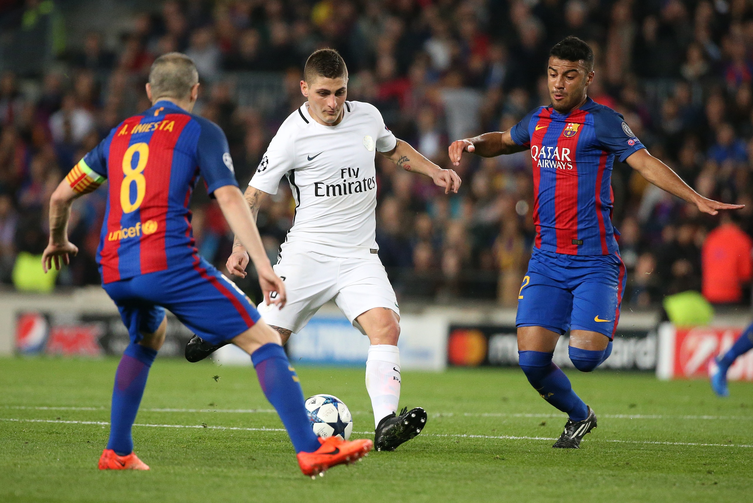 BARCELONA, SPAIN - MARCH 8: Marco Verratti of PSG and Rafinha of FC Barcelona in action during the UEFA Champions League Round of 16 second leg match between FC Barcelona and Paris Saint-Germain (PSG) at Camp Nou on March 8, 2017 in Barcelona, Spain. (Pho