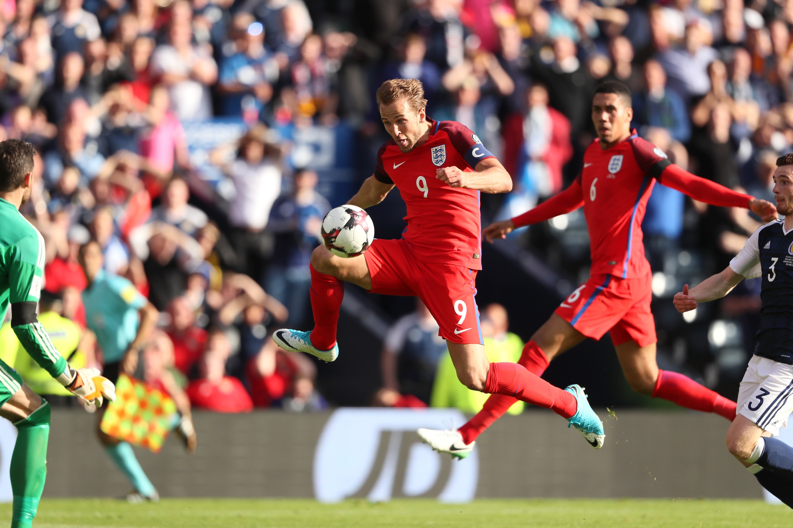 GLASGOW, SCOTLAND - JUNE 10:  Harry Kane of England scores a goal to make the score 2-2 during the FIFA 2018 World Cup Qualifier between Scotland and England at Hampden Park National Stadium on June 10, 2017 in Glasgow, Scotland.  (Photo by Matthew Ashton