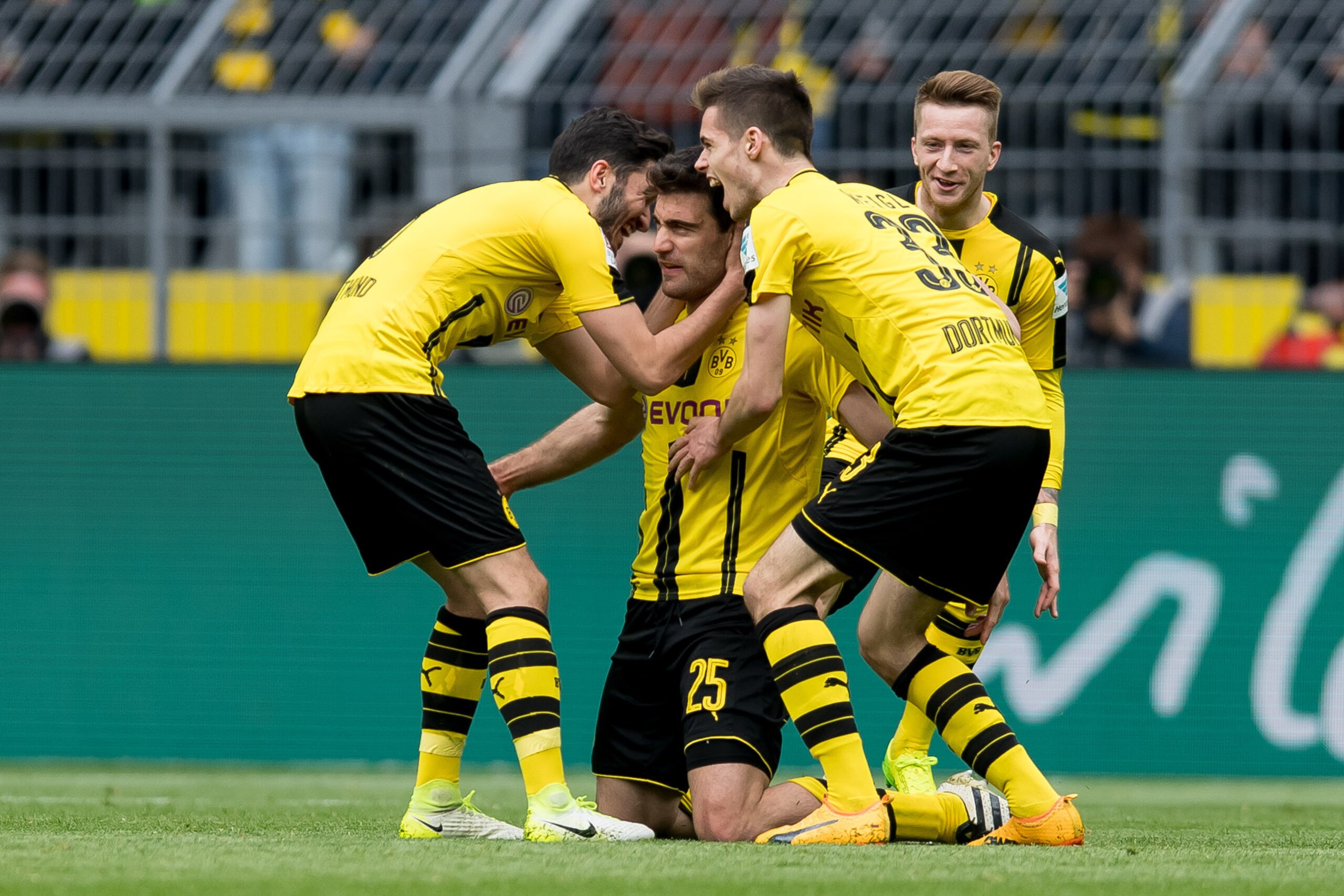 DORTMUND, GERMANY - APRIL 15: Sokratis of Dortmund celebrates after scoring his team`s second goal during the Bundesliga match between Borussia Dortmund and Eintracht Frankfurt at Signal Iduna Park on April 15, 2017 in Dortmund, Germany. (Photo by TF-Imag