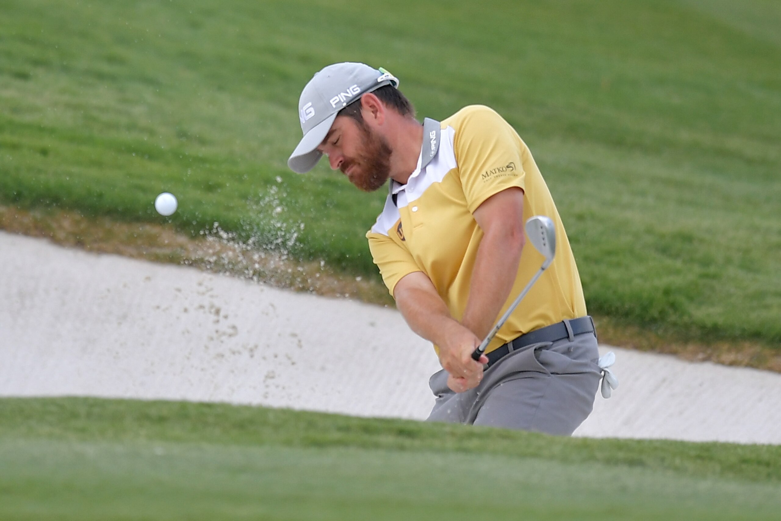 IRVING, TX - MAY 18:  Louis Oosthuizen of South Africa hits a shot out of the bunker on the 11th hole during Round One of the AT&T Byron Nelson at the TPC Four Seasons Resort Las Colinas on May 18, 2017 in Irving, Texas.  (Photo by Drew Hallowell/Getty Im