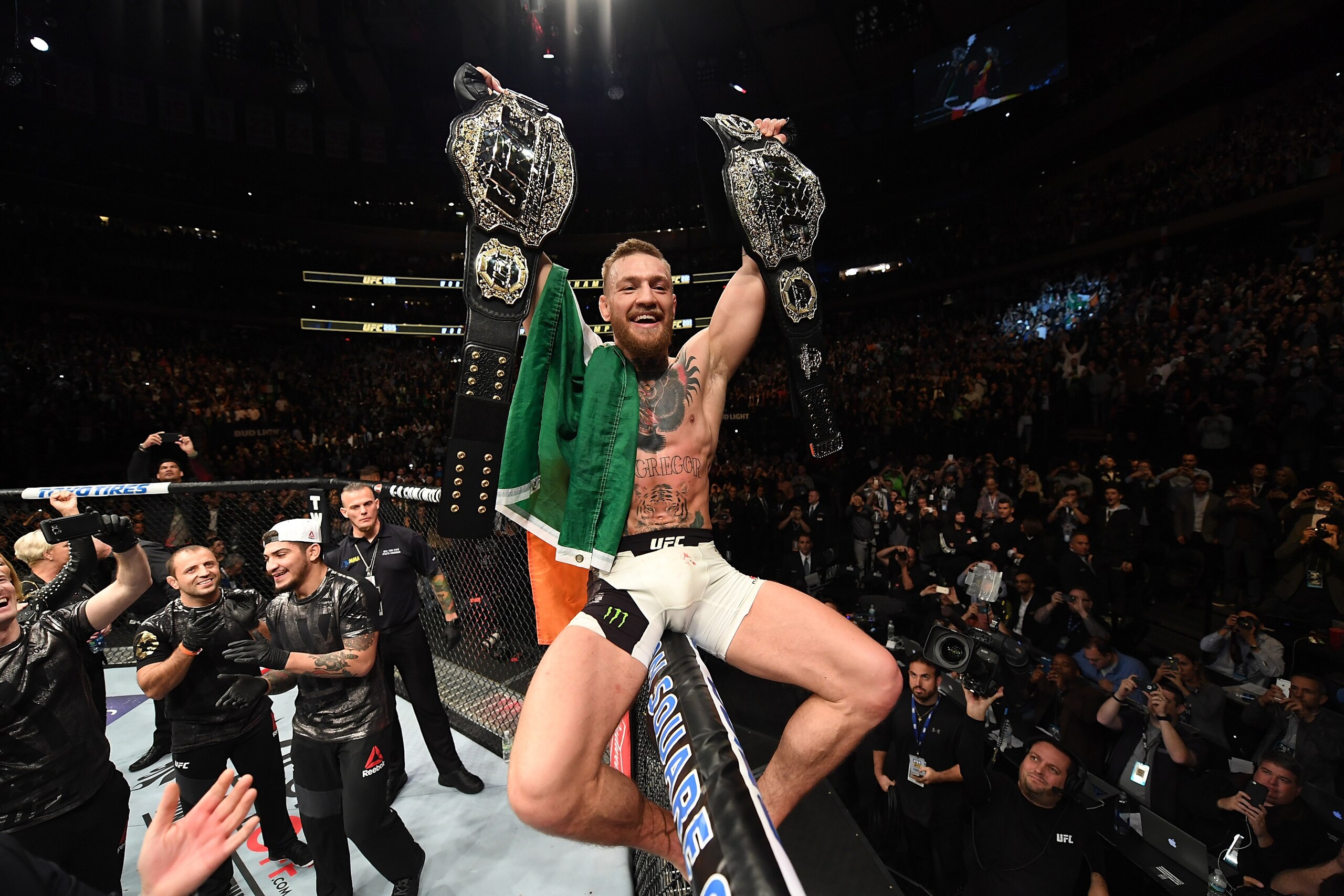 NEW YORK, NY - NOVEMBER 12:  UFC lightweight and featherweight champion Conor McGregor of Ireland celebrates after defeating Eddie Alvarez in their UFC lightweight championship fight during the UFC 205 event at Madison Square Garden on November 12, 2016 i