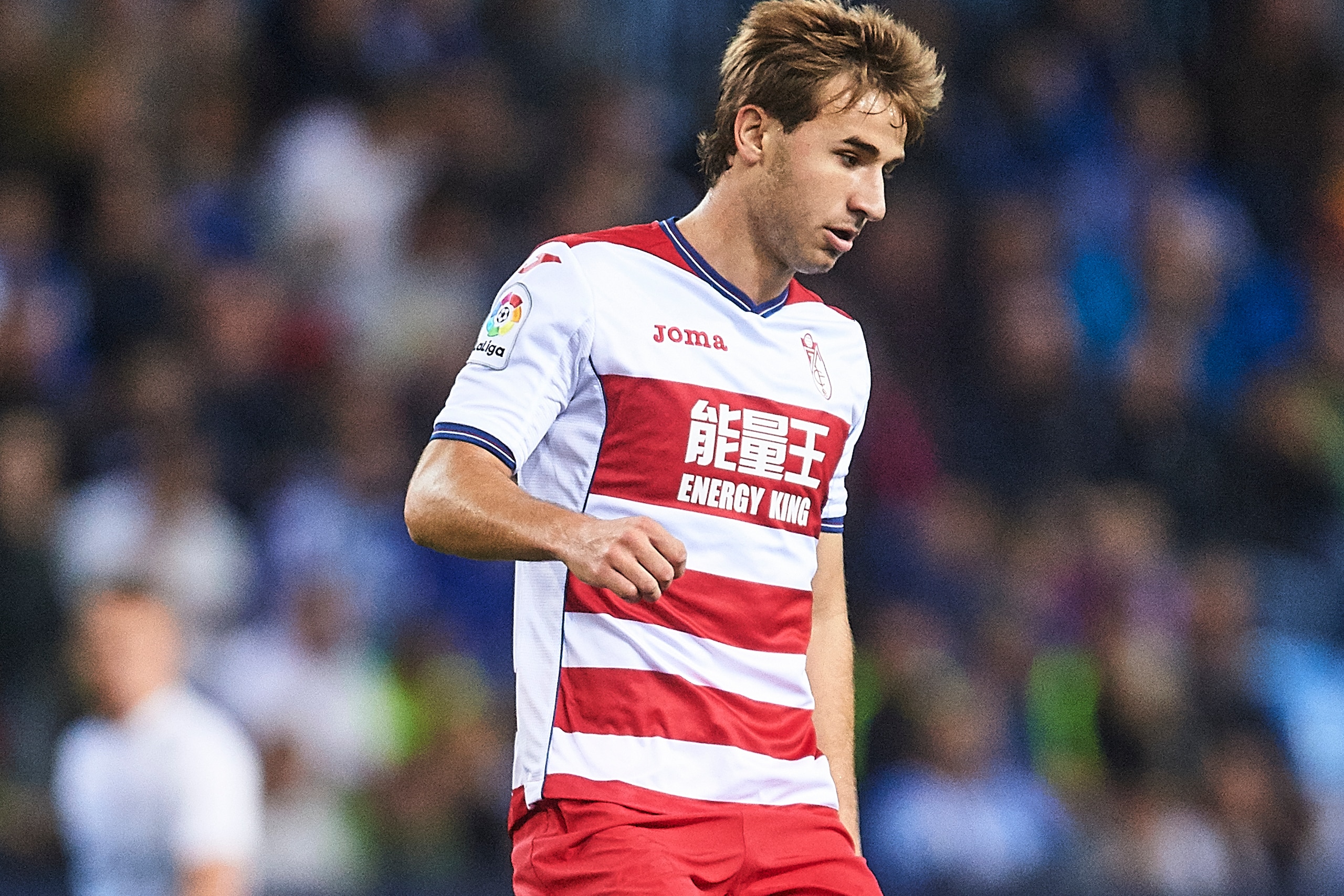 MALAGA, SPAIN - DECEMBER 09:  Sergi Samper of Granada CF in action during La Liga match between Malaga CF and Granada CF at La Rosaleda Stadium December 9, 2016 in Malaga, Spain.  (Photo by Aitor Alcalde Colomer/Getty Images)
