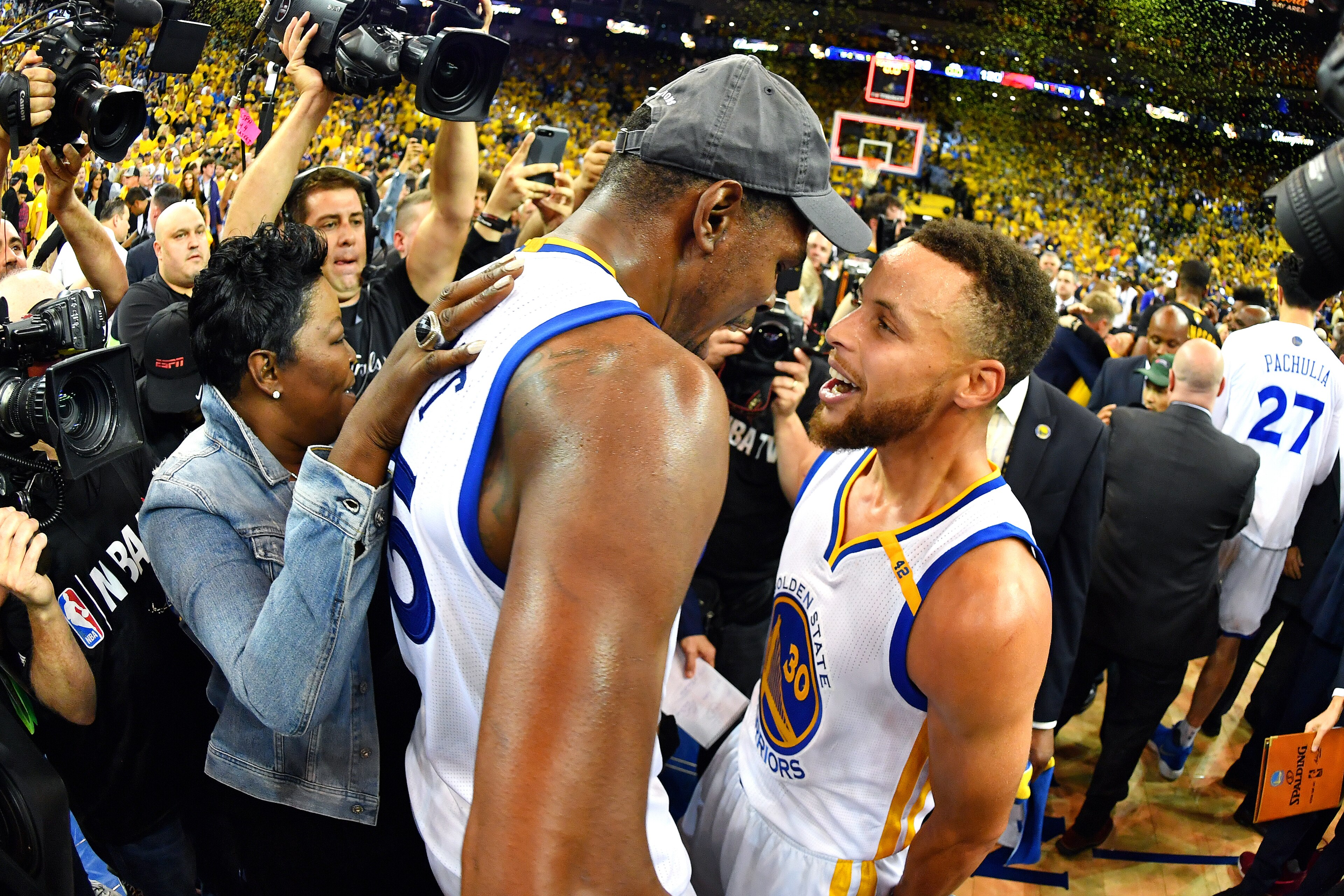 OAKLAND, CA - JUNE 12: Stephen Curry #30 and Kevin Durant #35 of the Golden State Warriors celebrate after winning the 2017 NBA Finals on June 12, 2017 at ORACLE Arena in Oakland, California. NOTE TO USER: User expressly acknowledges and agrees that, by d OAKLAND, CA - JUNE 12: Stephen Curry #30 and Kevin Durant #35 of the Golden State Warriors celebrate after winning the 2017 NBA Finals on June 12, 2017 at ORACLE Arena in Oakland, California. NOTE TO USER: User expressly acknowledges and agrees that, by d