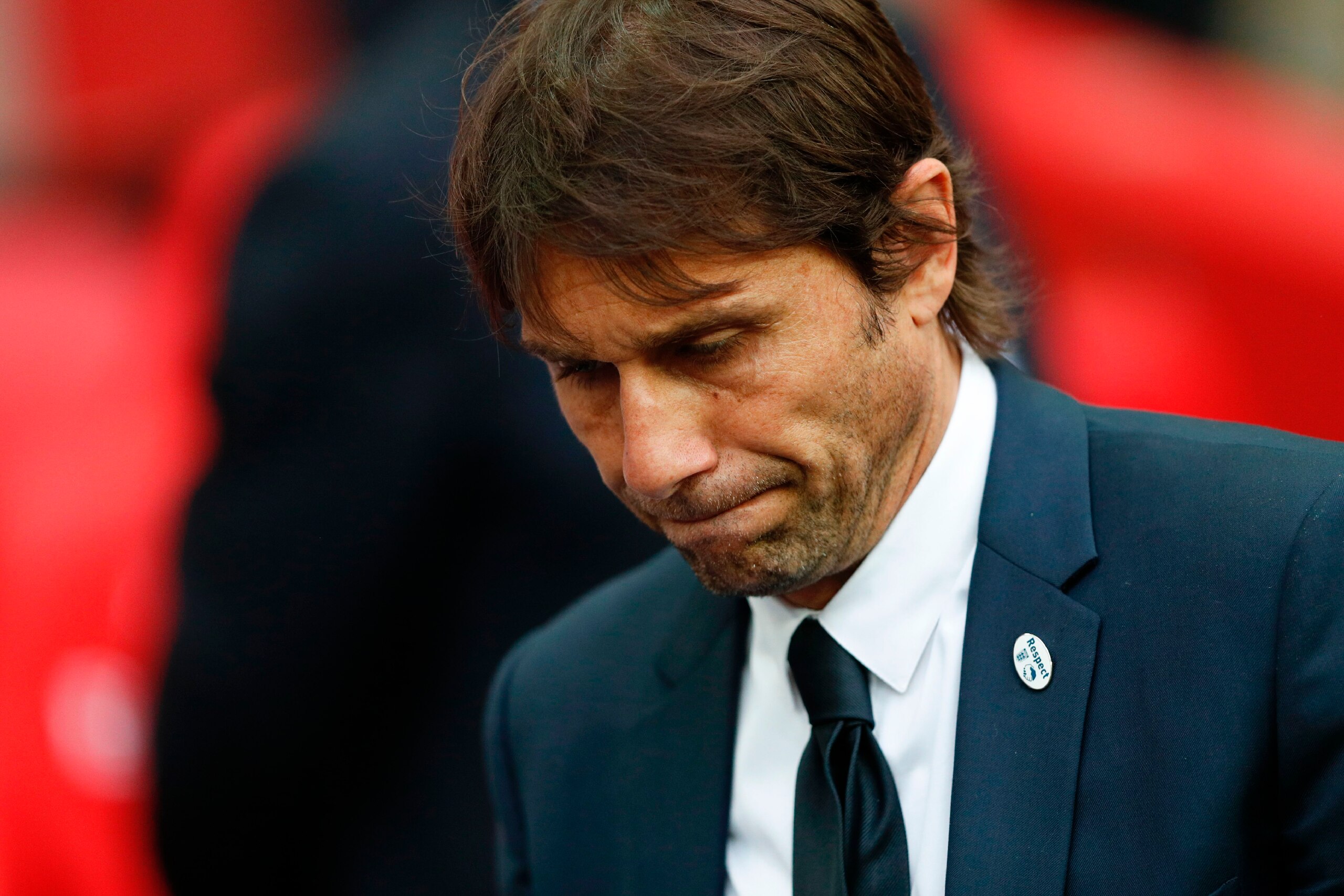 Chelsea's Italian head coach Antonio Conte reacts on the pitch after their defeat to Arsenal after the English FA Cup final football match between Arsenal and Chelsea at Wembley stadium in London on May 27, 2017.
Aaron Ramsey scored a 79th-minute header t