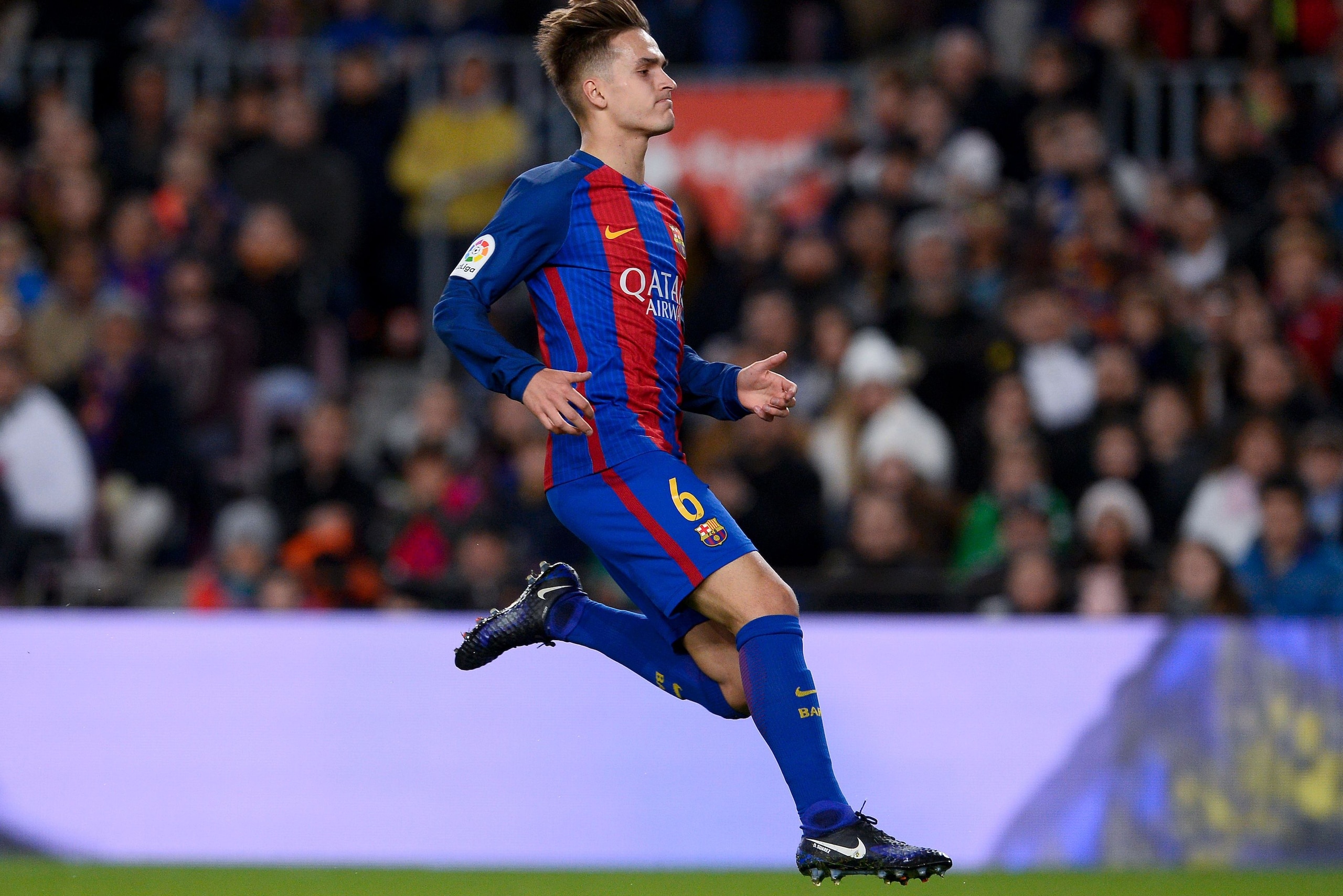 Barcelona's midfielder Denis Suarez jumps during the Spanish Copa del Rey (King's Cup) round of 32 second leg football match FC Barcelona vs Hercules CF at the Camp Nou stadium in Barcelona on December 21, 2016. / AFP / JOSEP LAGO        (Photo credit sho