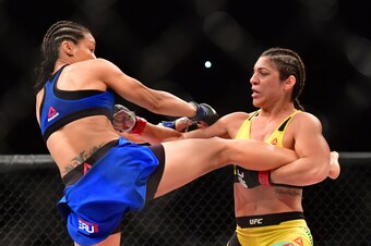 Mar 11, 2017; Fortazela, Brazil, USA; Bethe Correia (red gloves) fights Marion Reneau (blue gloves) during UFC Fight Night at Centro de Formacao Olimpica de Fortaleza. Mandatory Credit: Jason Silva-USA TODAY Sports
